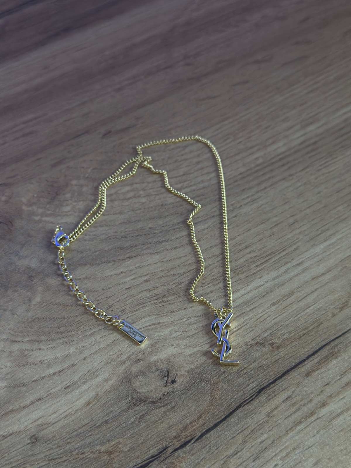 Saint Laurent YSL Monogram Pendant Gold Tone Necklace Adjustable Chain Luxury