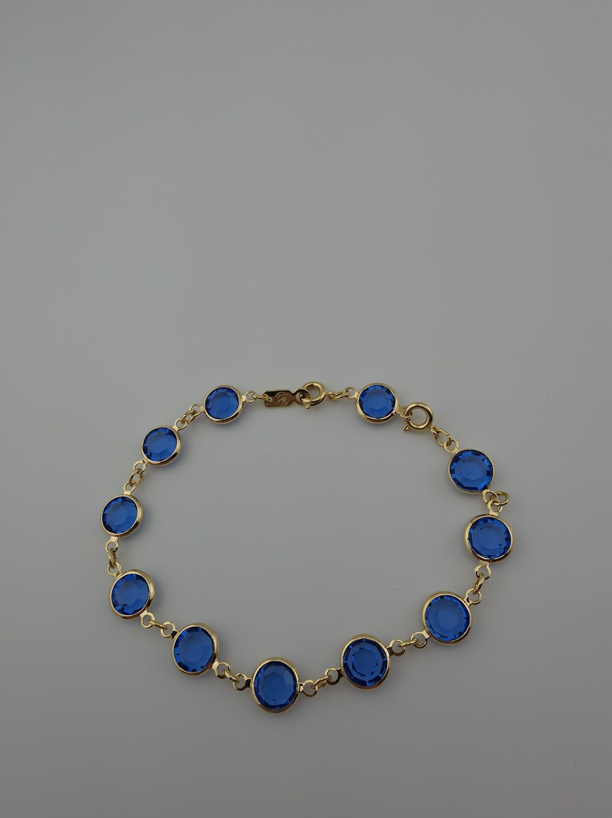 Vintage Swarovski Bezel Set Blue Stone Goldtone Bracelet Swan Mark 7.5″ Extender
