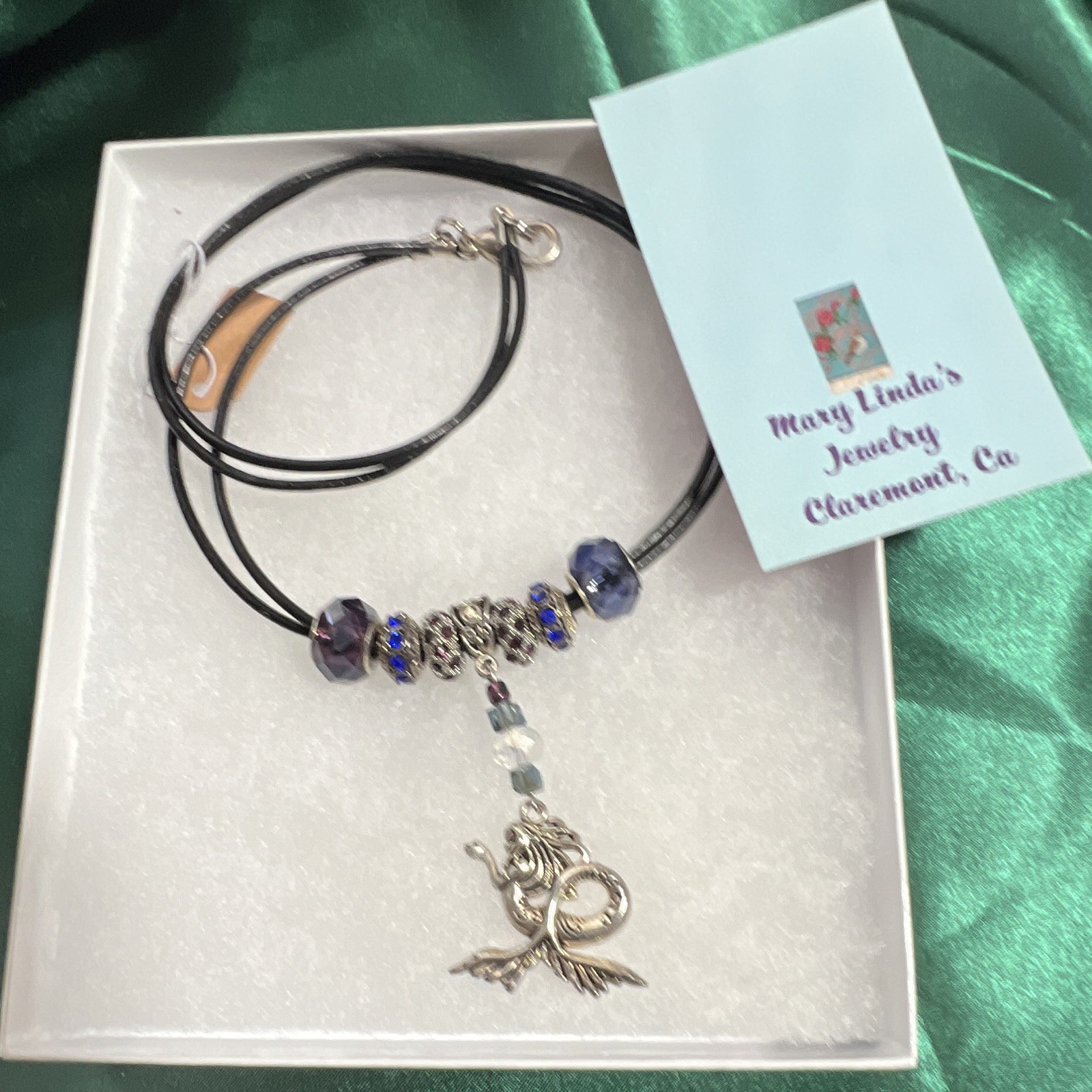 16 inch double leather crystal and sterling silver mermaid pendant.