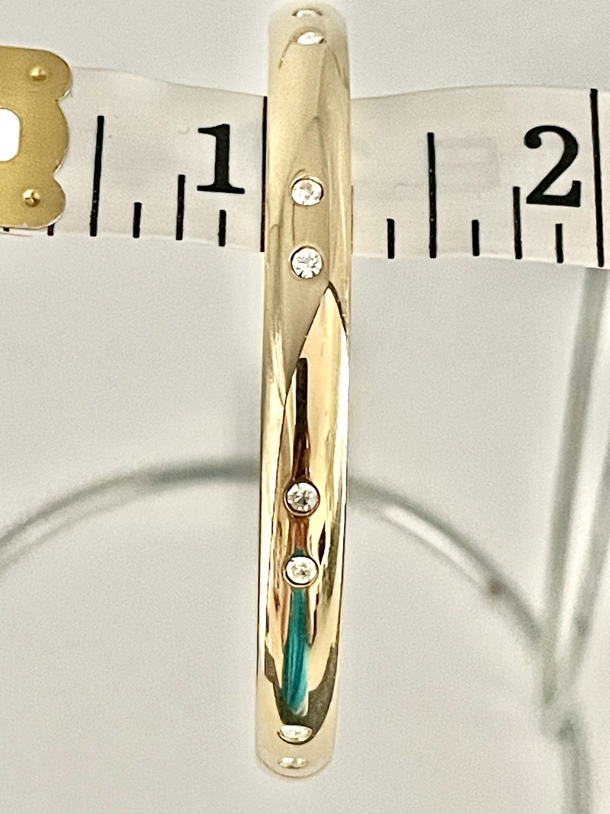 Swarovski Gold Tone Bangle Bracelet with Scattered Crystal Accents Swan Logo