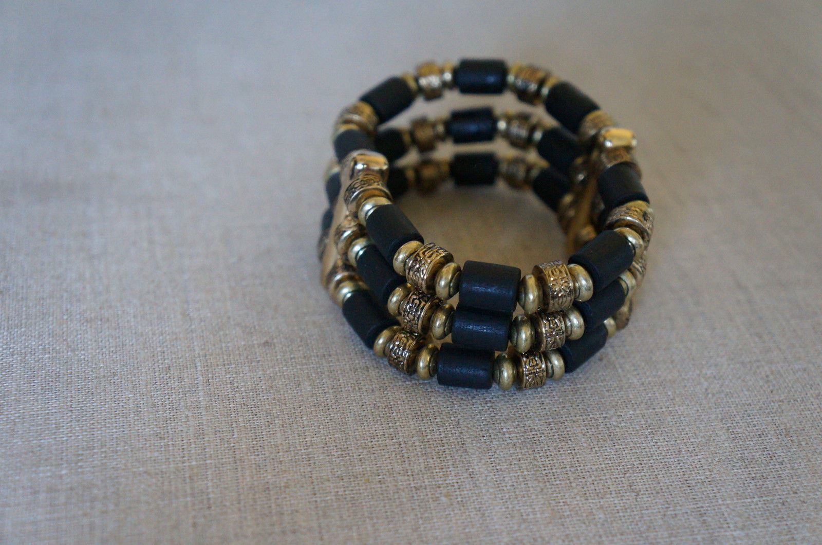 NEW Jenny Bird Tibetove Cuff Bracelet Gold & Hand Carved Wooden Beads Black