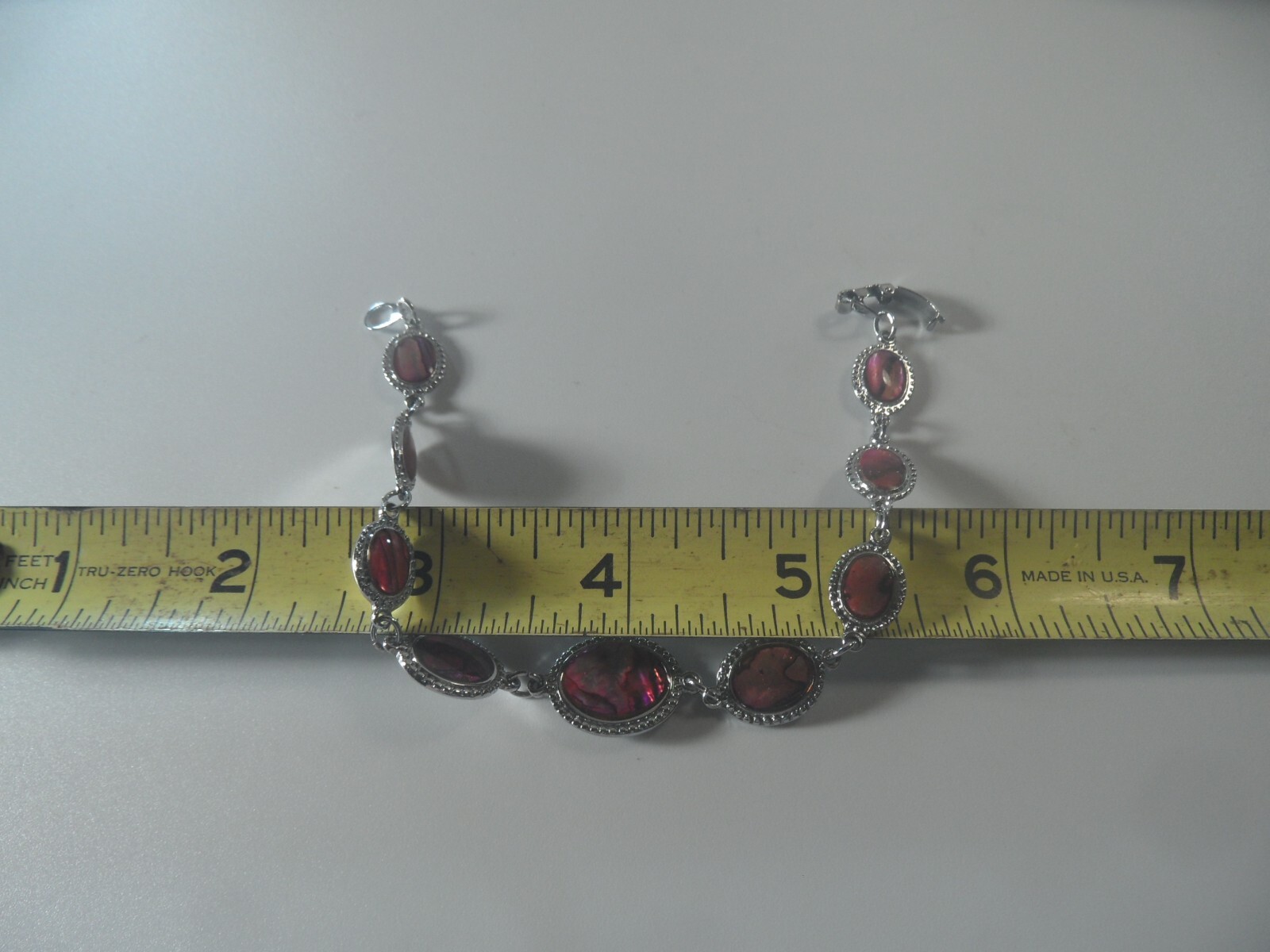 D2- 47 costume jewelry 7″ bracelet silvertone with faux abalone design