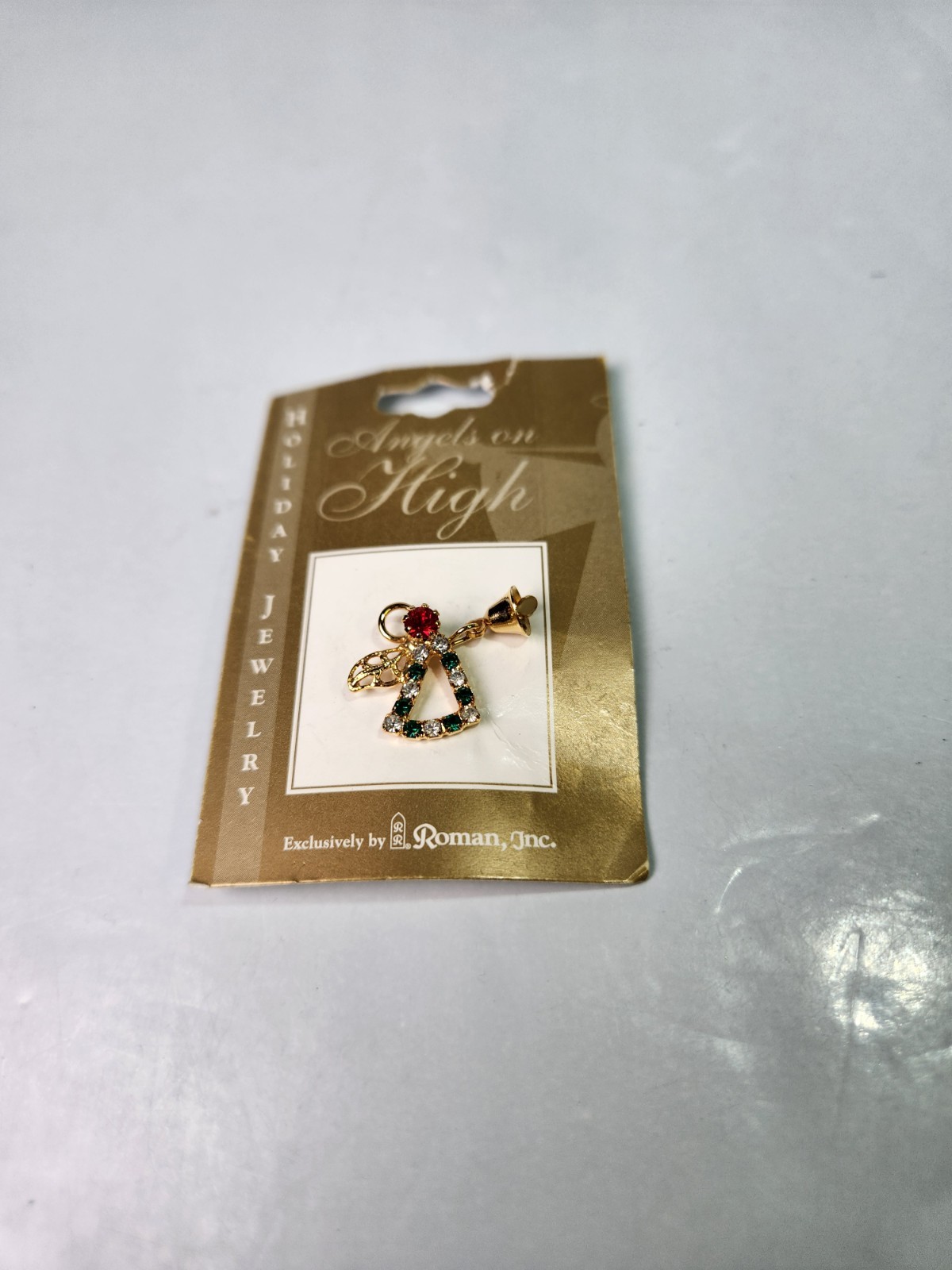 Christmas Pin Angels On High Roman Inc Gold Tone Green And Clear Crystals 2001