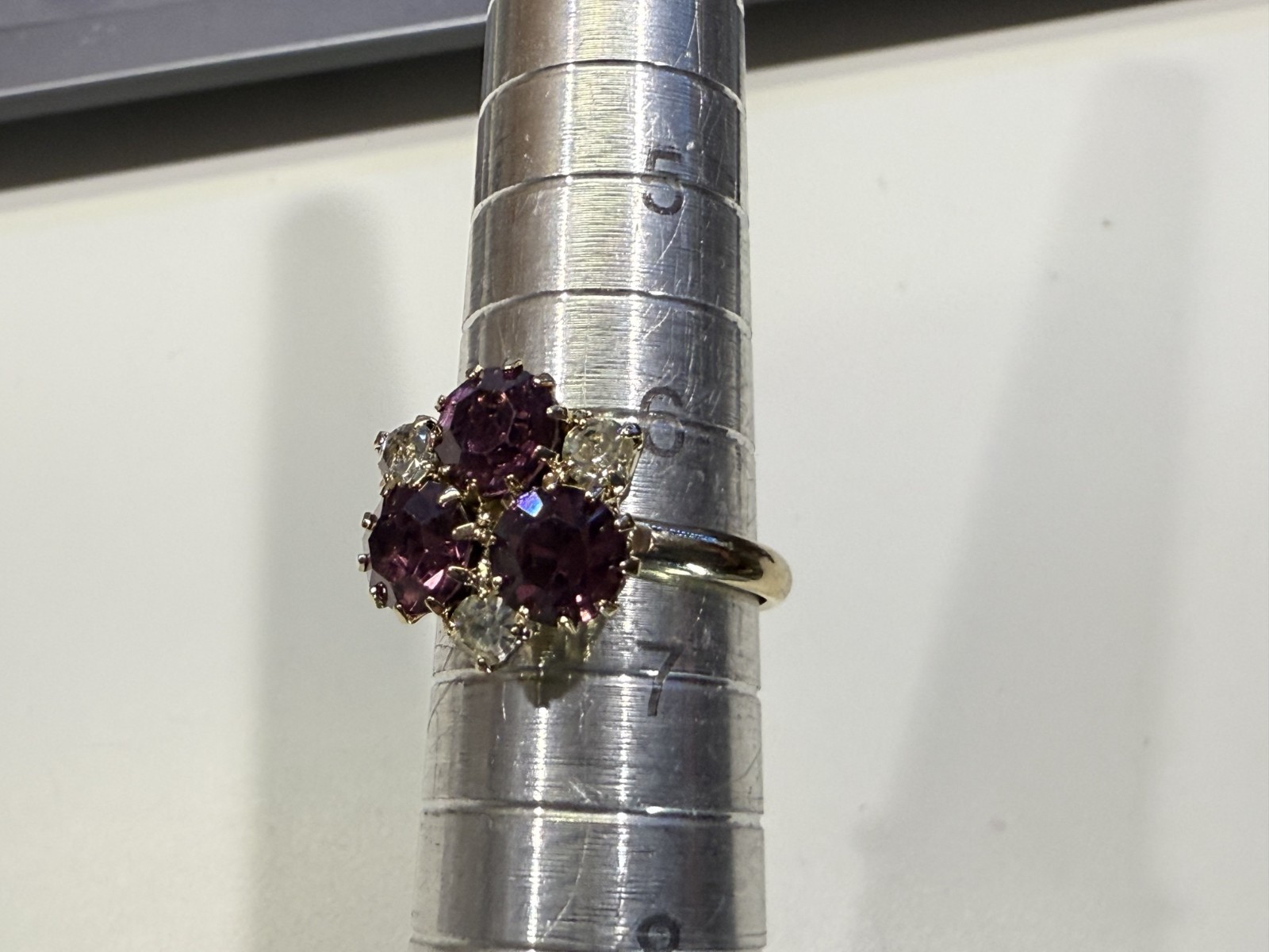 Gold tone with purple & clear stone cluster fashion ring Size 6.5 adjustable
