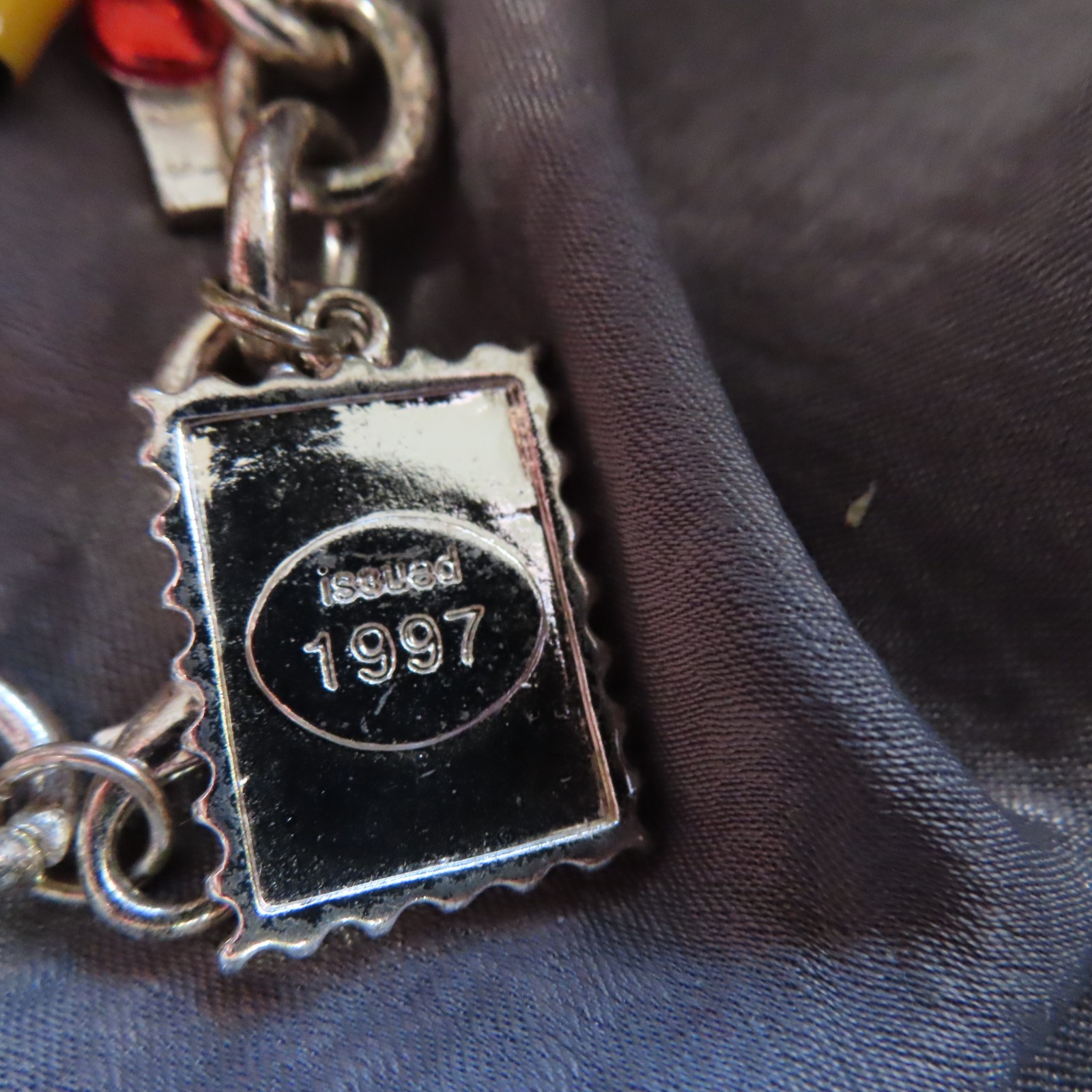Education themed US Postal Stamp charm bracelet, silver-tone