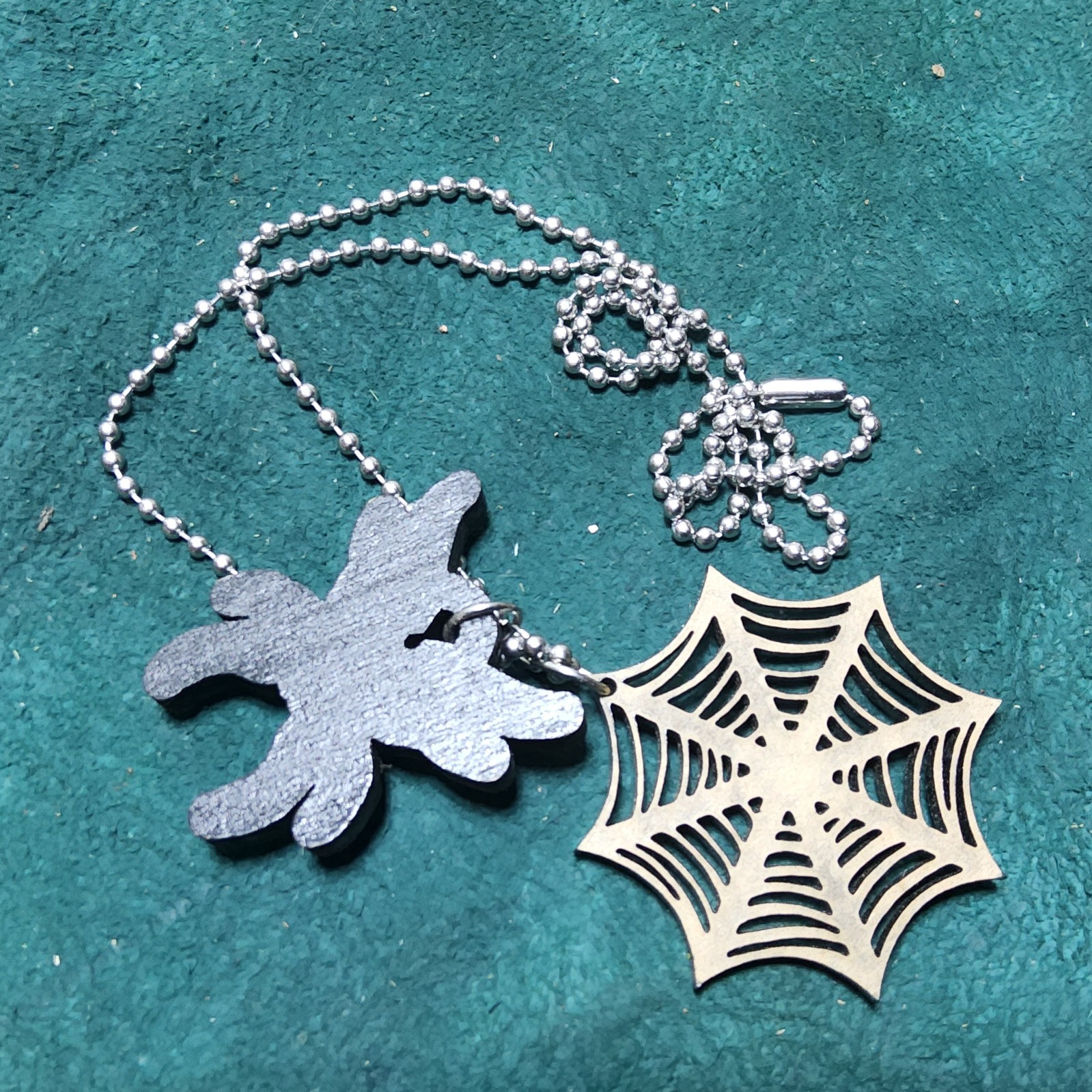 Laser cut arachnid queen magnets spider web necklace set goth scifi pinup art