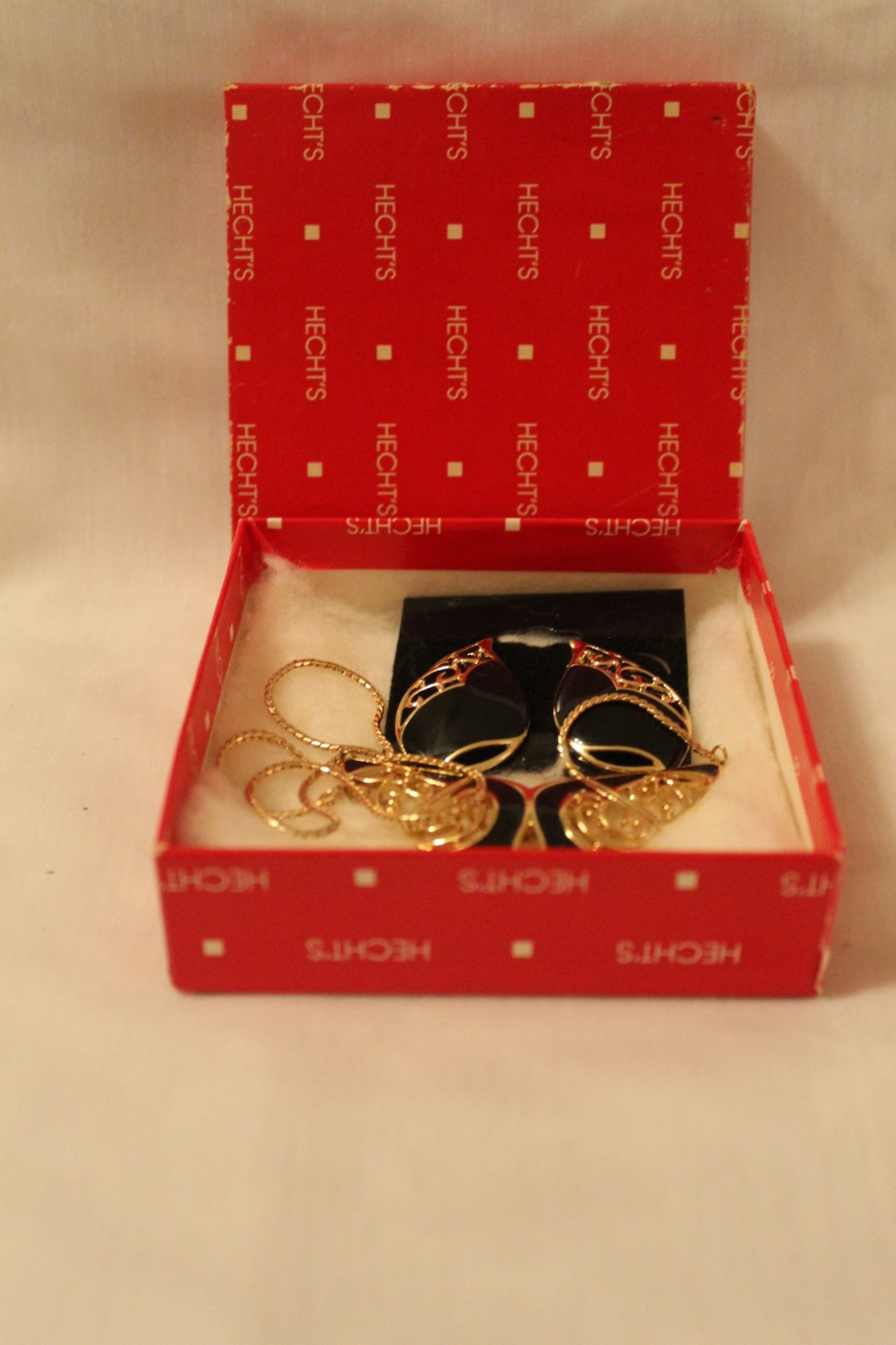 Filligree style necklace 17in and earrings. Gold plated with black emerald inlay