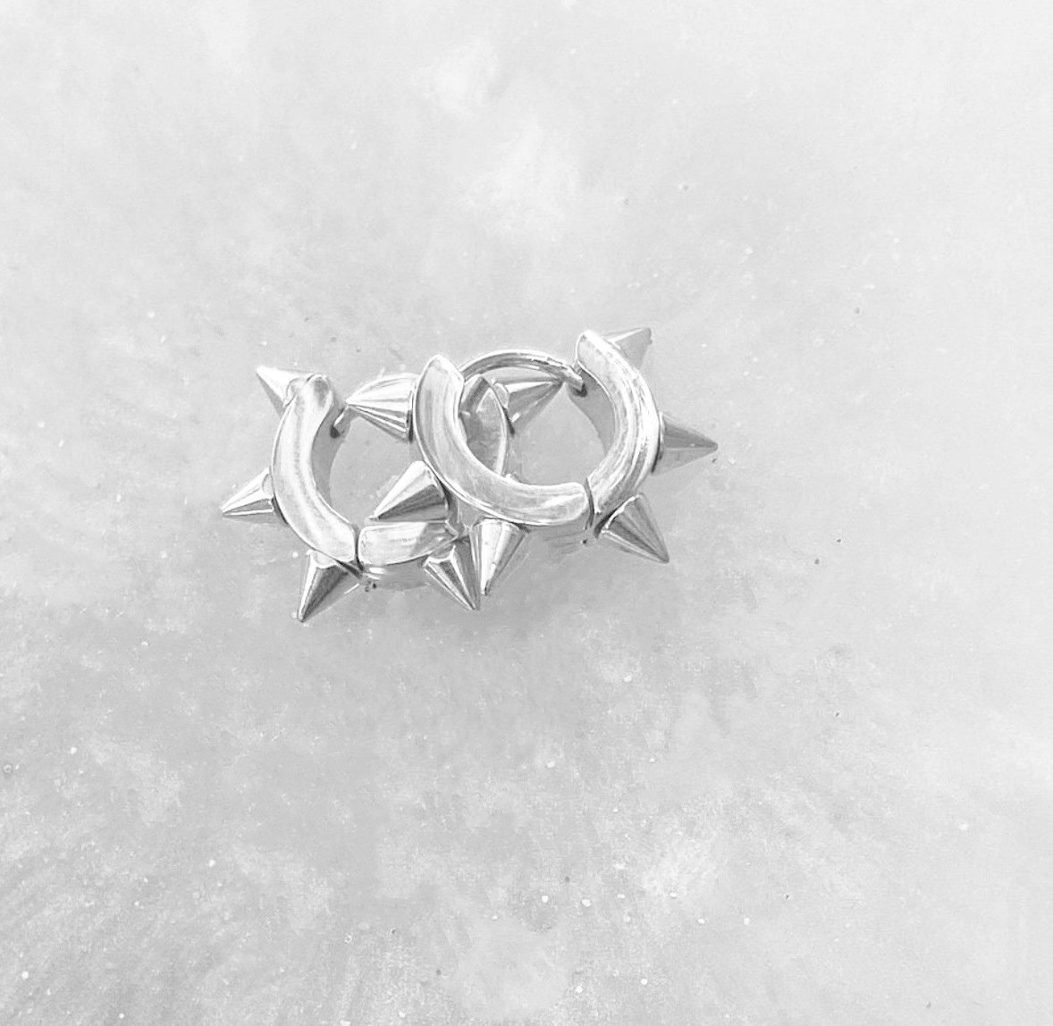 Silver Titanium Spike Huggie Hoop Earrings.