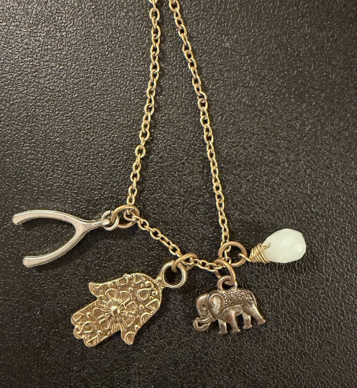 LEILA Jewelry Gold Tone Lucky Charm Necklace w/ Hamsa, Elephant & Wishbone 18in