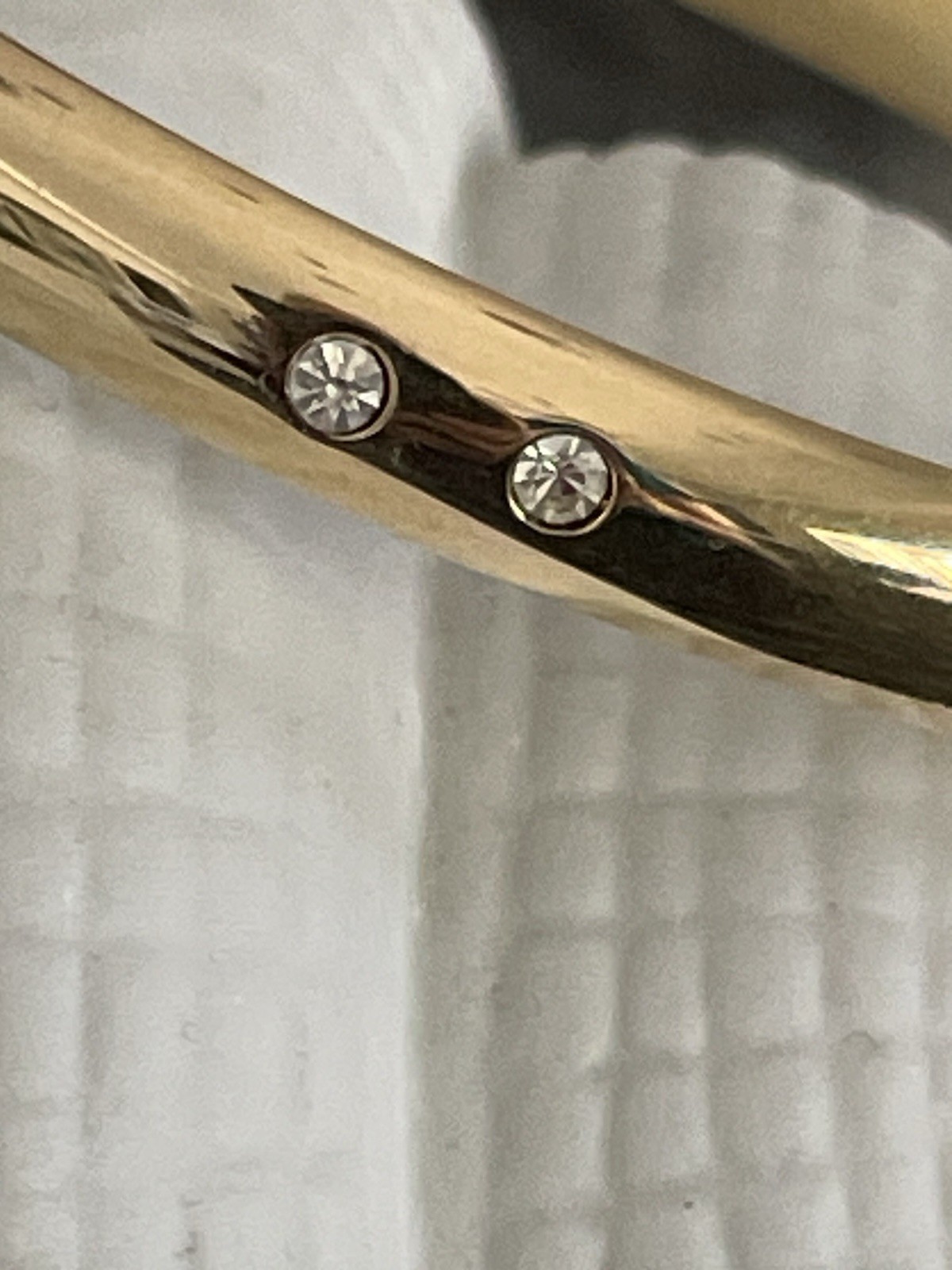 Swarovski Gold Tone Bangle Bracelet with Scattered Crystal Accents Swan Logo