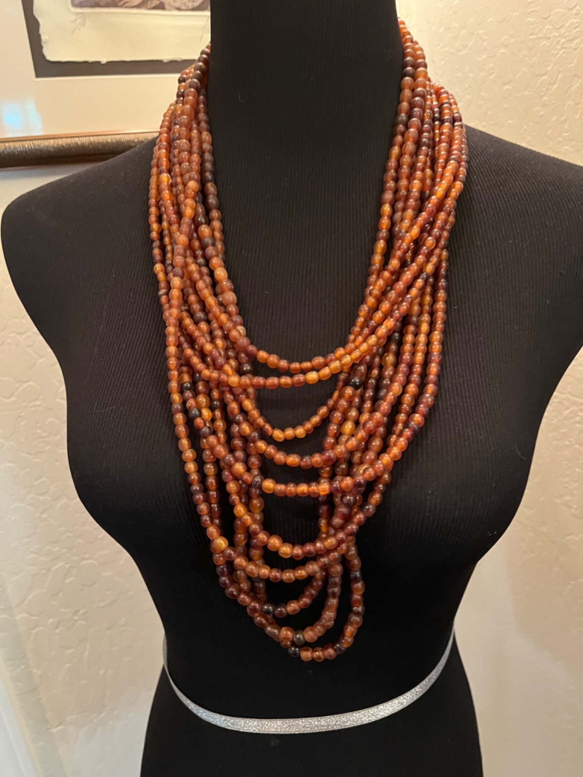 Multilayer warm brown draped necklace possibly acrylic brown clasp