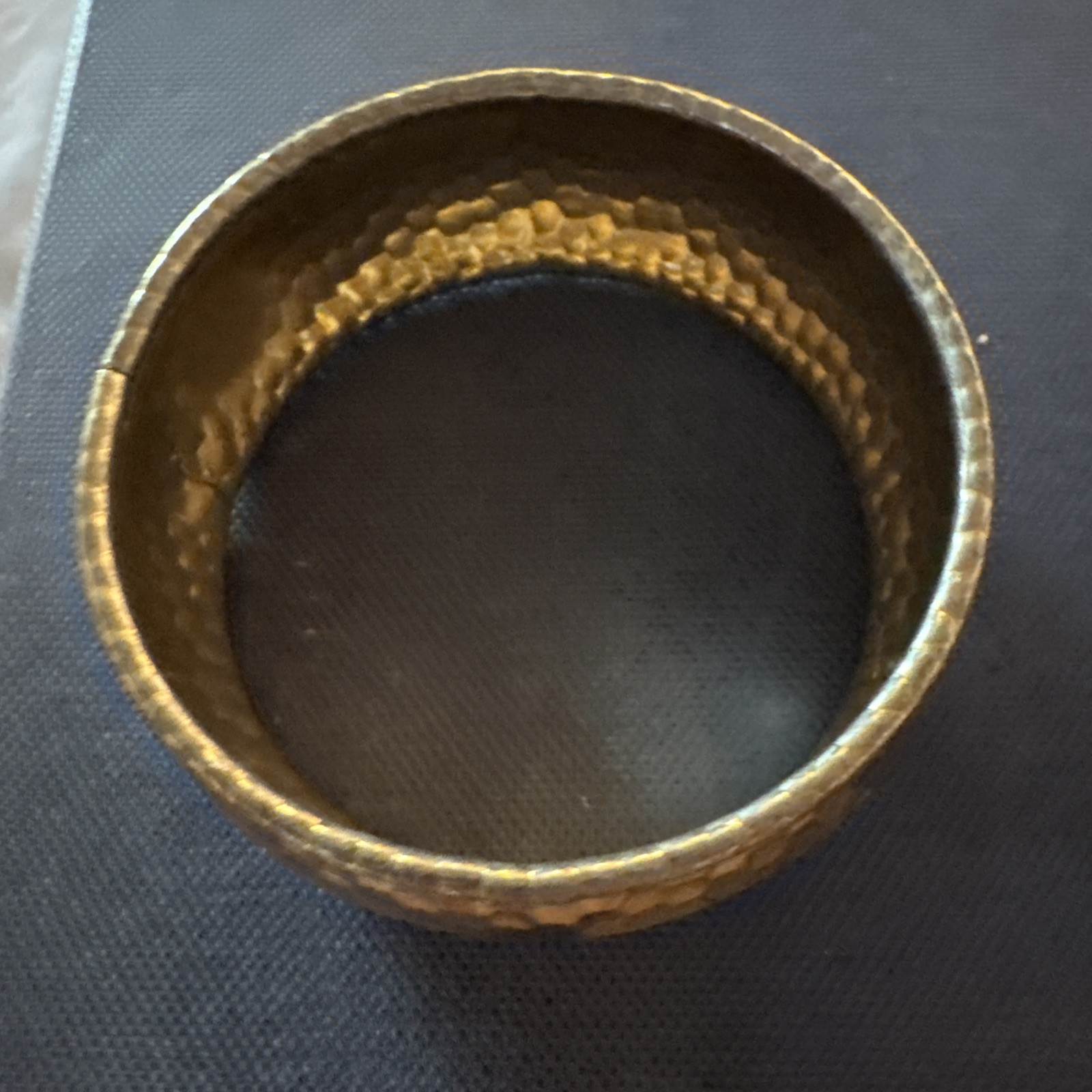 Hammered silver metal with a hint of gold tone overlay bracelet bangle no mark