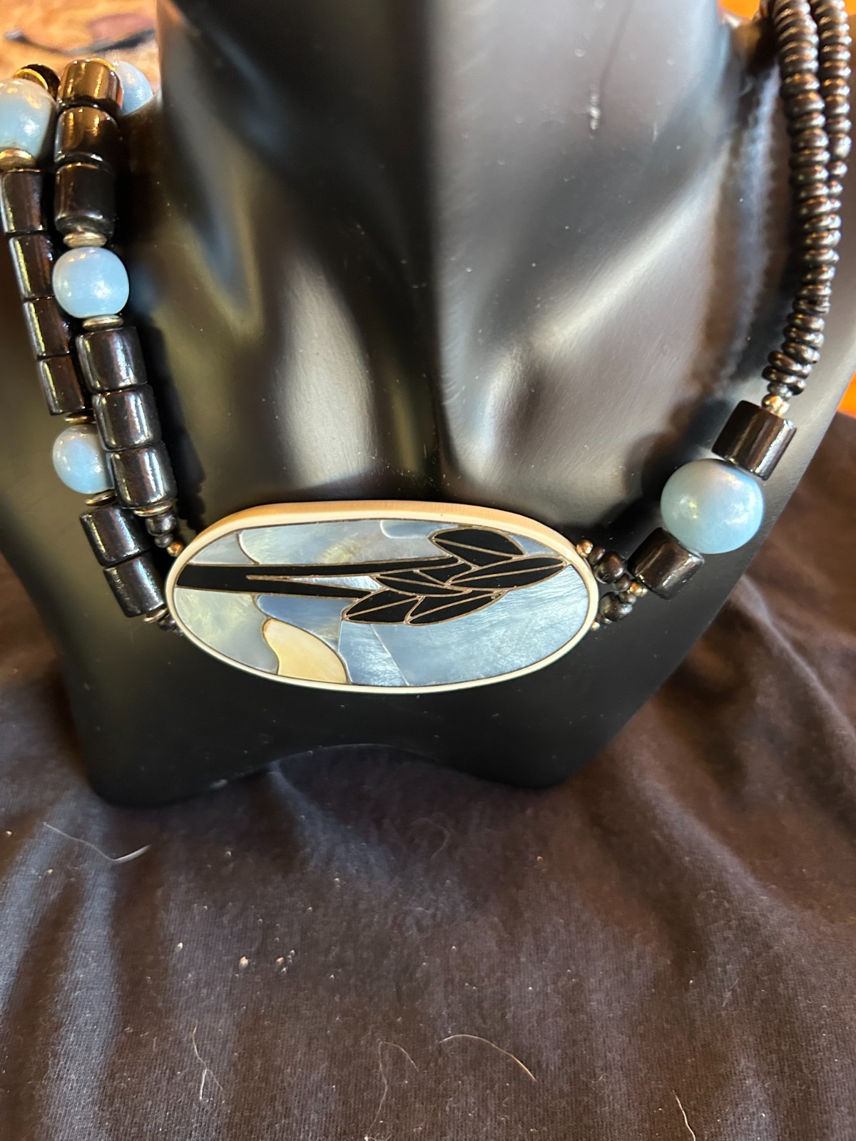 21″ necklace with mulitiple beads with Mother of Pearl! One of a kind!