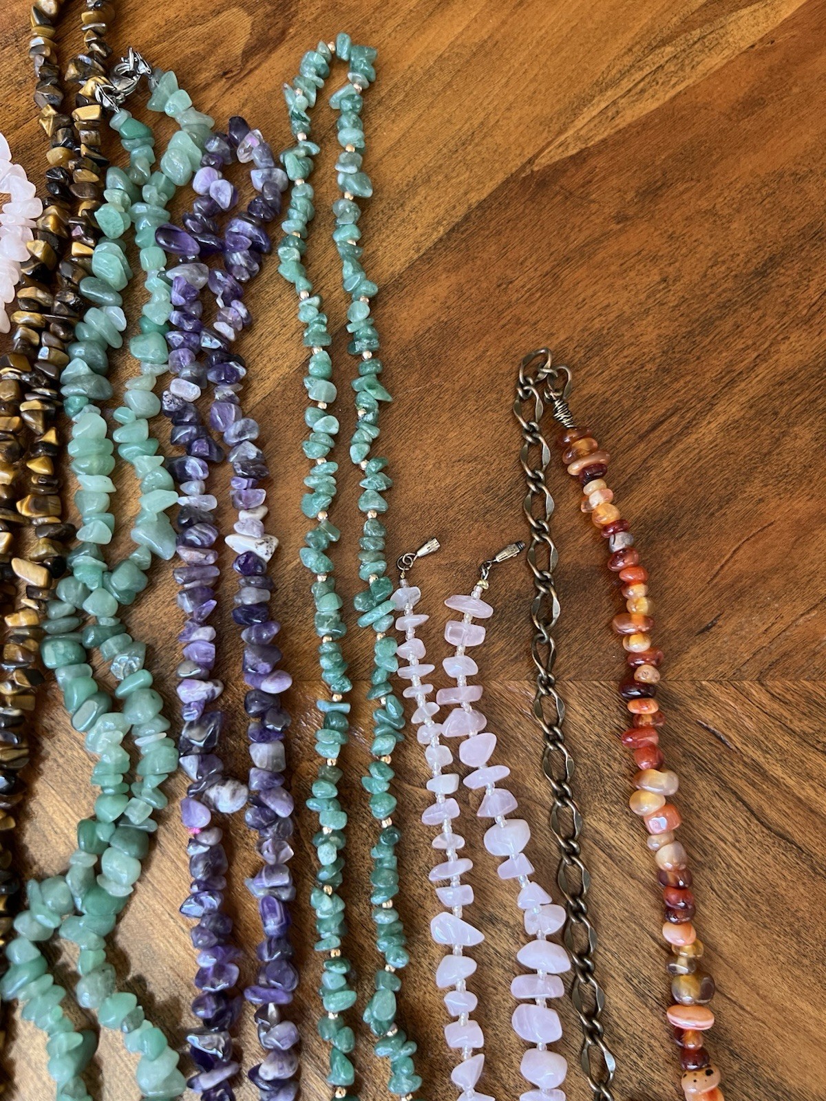 Spectacular lot of natural stone necklaces in pink, green, and brown