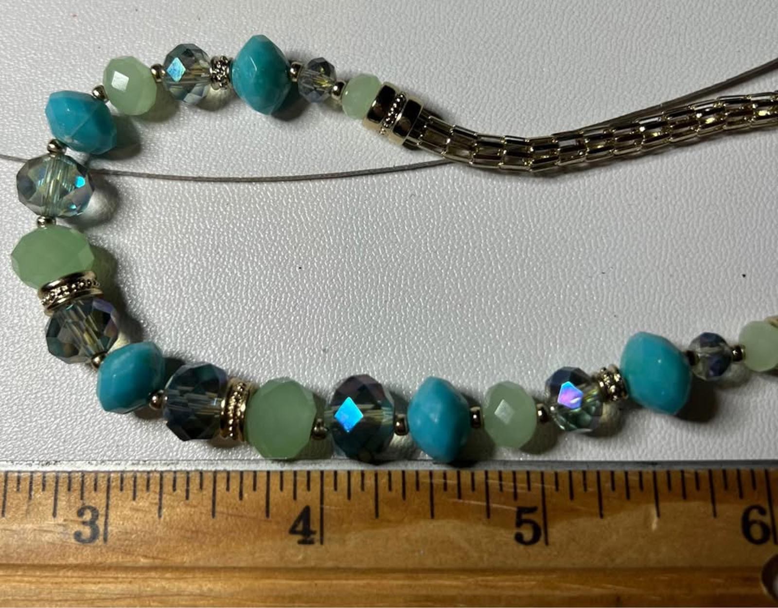 Shiny Blue and Gold Tone Necklace in Perfect Condition