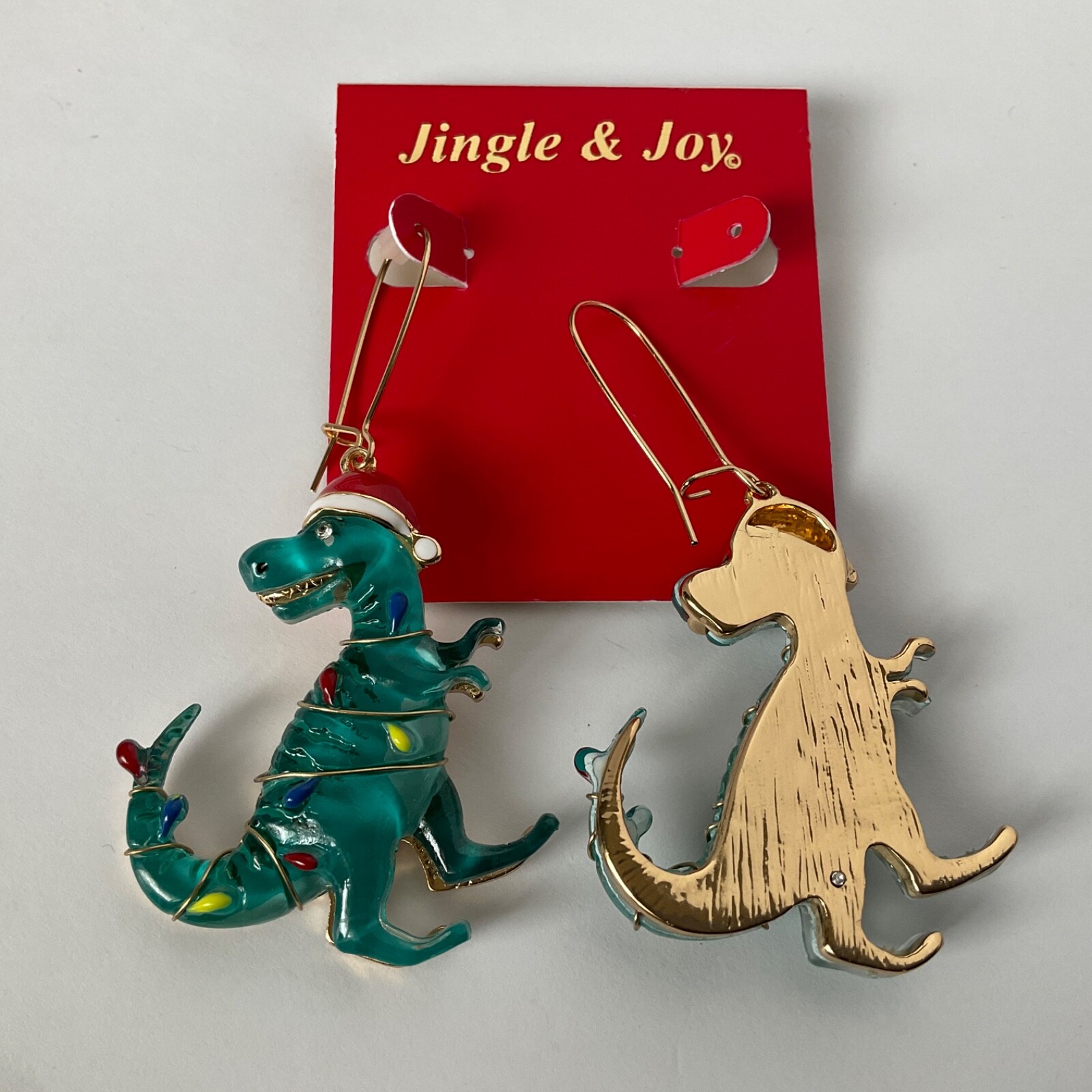 T-Rex Christmas Dinosaur Earrings Wearing Christmas Lights & Santa Hat