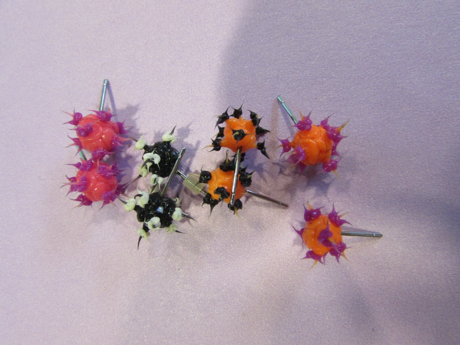 4 pair rubber pierced post earrings pink, purple, orange, black, white – 1 back