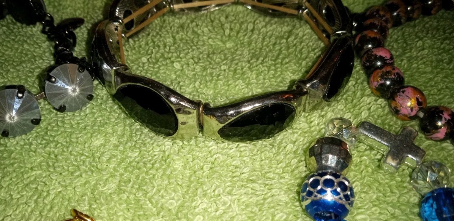 MULTIPLE FASHION BRACELETS MOST STRETCHY BUT SOME PRETTY ONES, SOME SIGNED BRASS