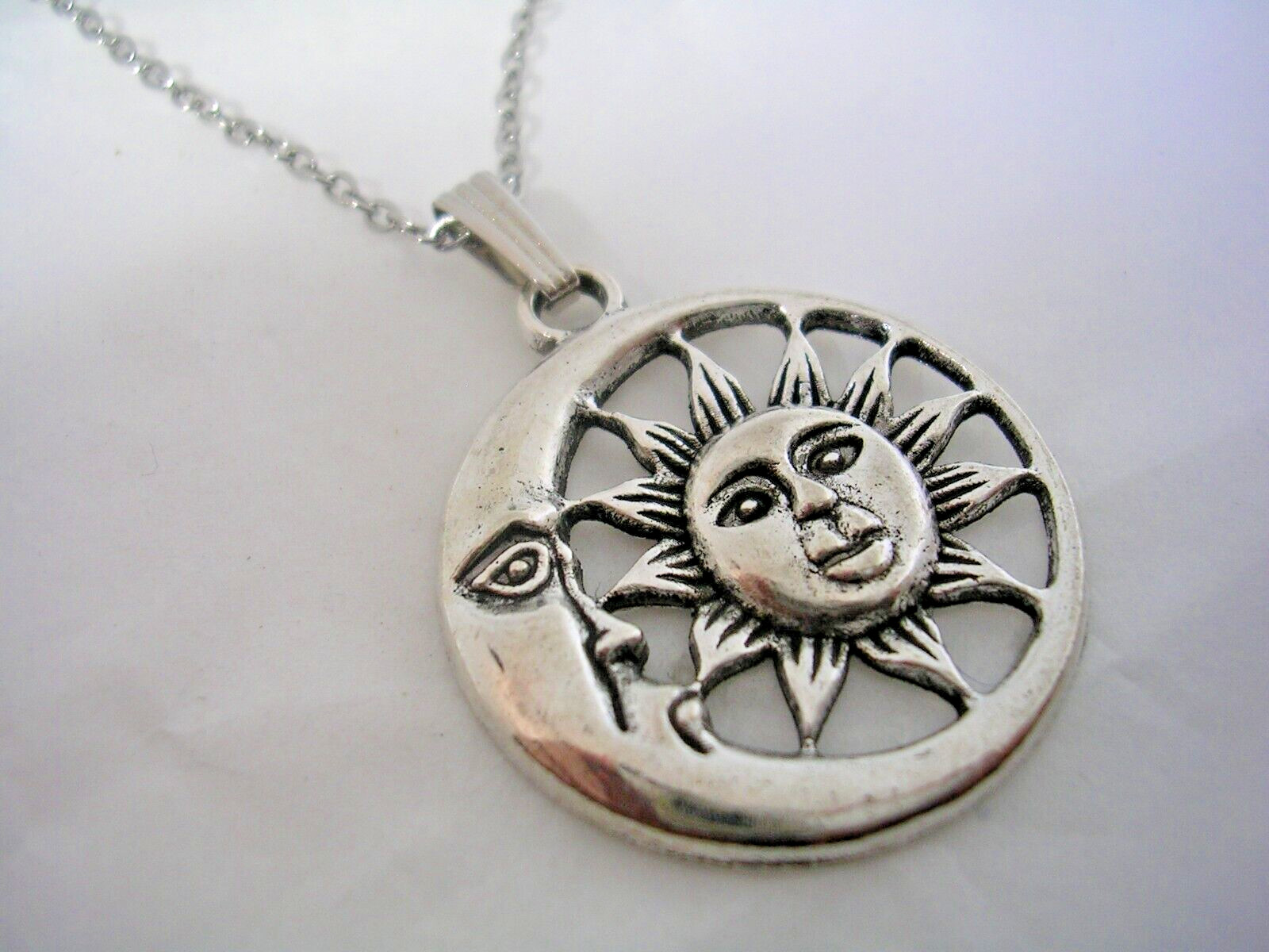 MOON AND SUN PENDANT WITH FACES ALL HIGH POLISHED IN STAINLESS STEEL WITH CHAIN