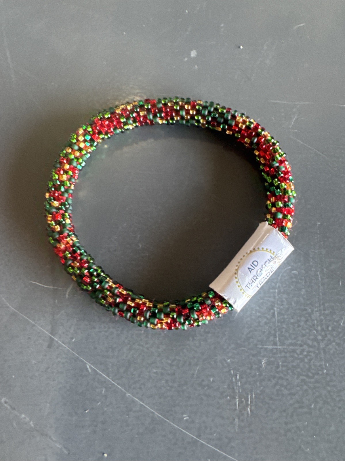 Aid Through Trade Roll-On® Bracelet “Nutcracker Speckled” Glass Beads ~Nepal~