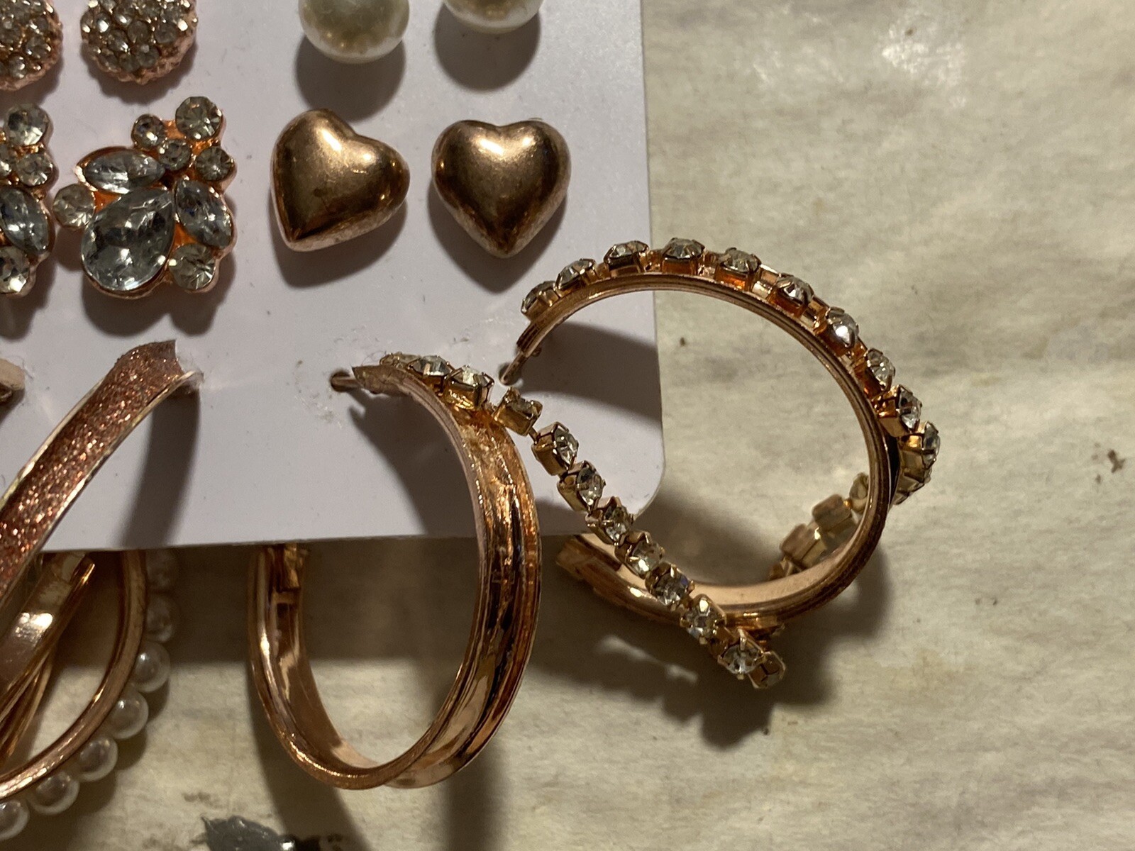 8 Pair Of Pierced Earrings On A Card