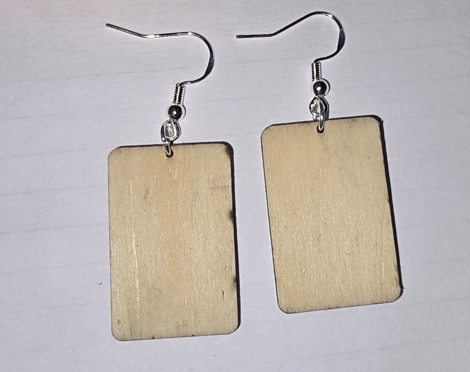 “No Kings” Protest Sign style Earrings, laser cut from painted wood.