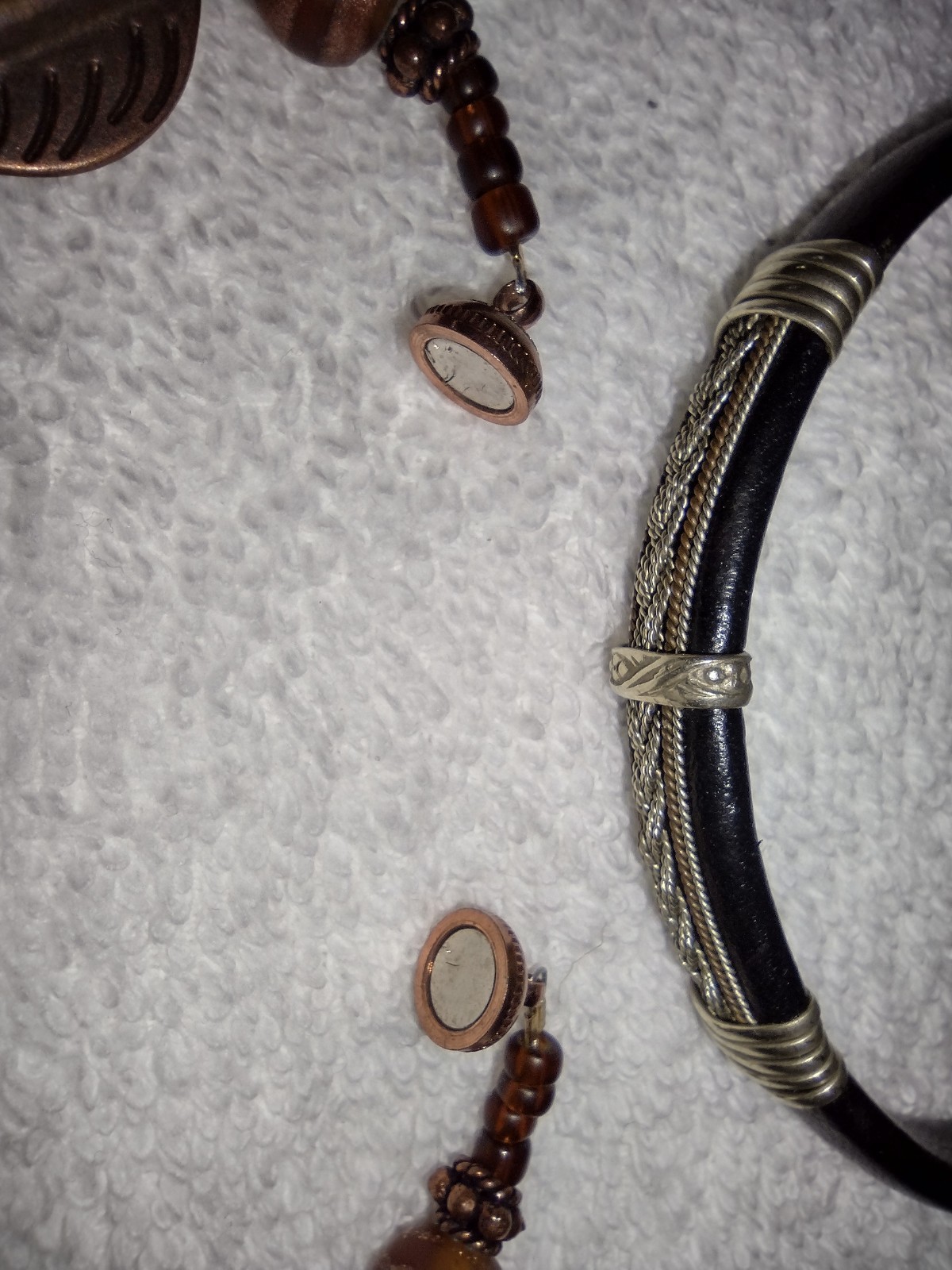 Lot of 2 brown/cooper tone decorative bracelets, one has magnetic closure