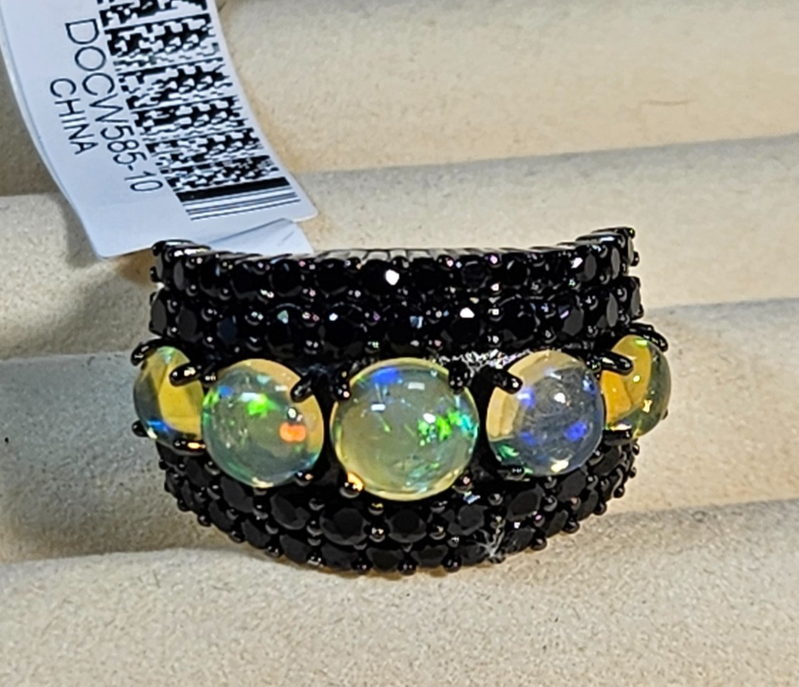 2.73ctw Round Cabochon Ethiopian Opal 3.24ctw Round Black Spinel Rhodium .925