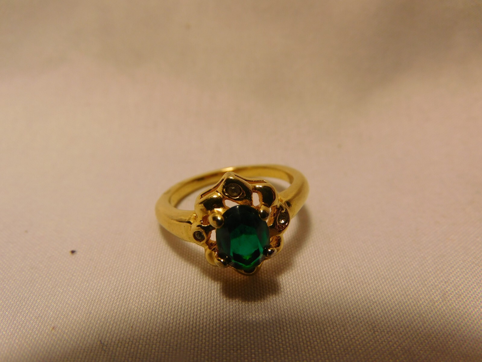 Beautiful Emerald Solitaire, With (2) Small Simulated Diamond Accent Stones