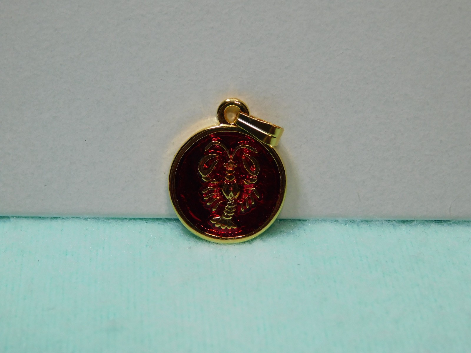 H.Stern 3/4″ Red (zodiac) Cancer Pendant in Very Good Cond.