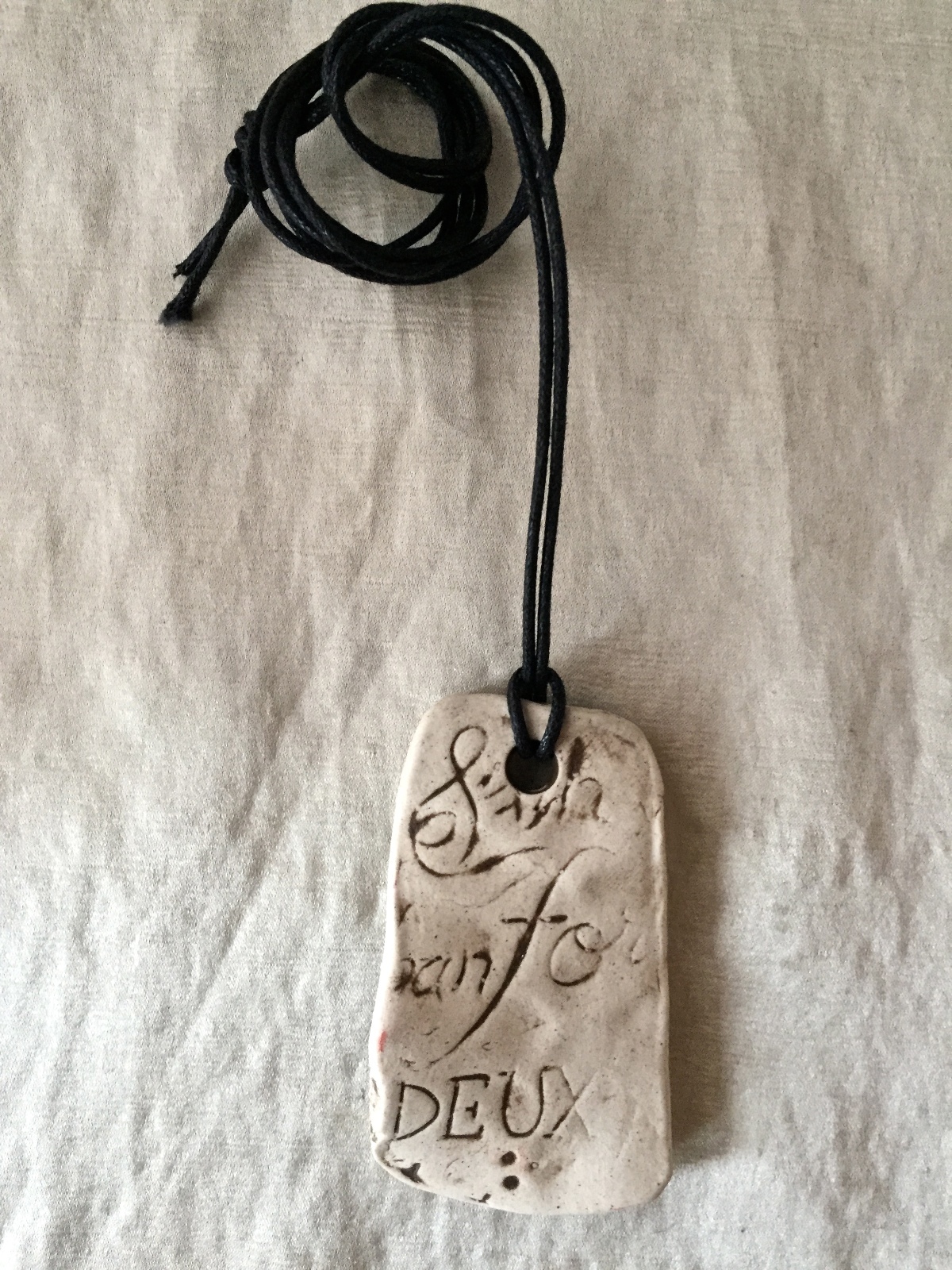 Vintage Unworn Donna Karan Ceramic ” Words” Pendant