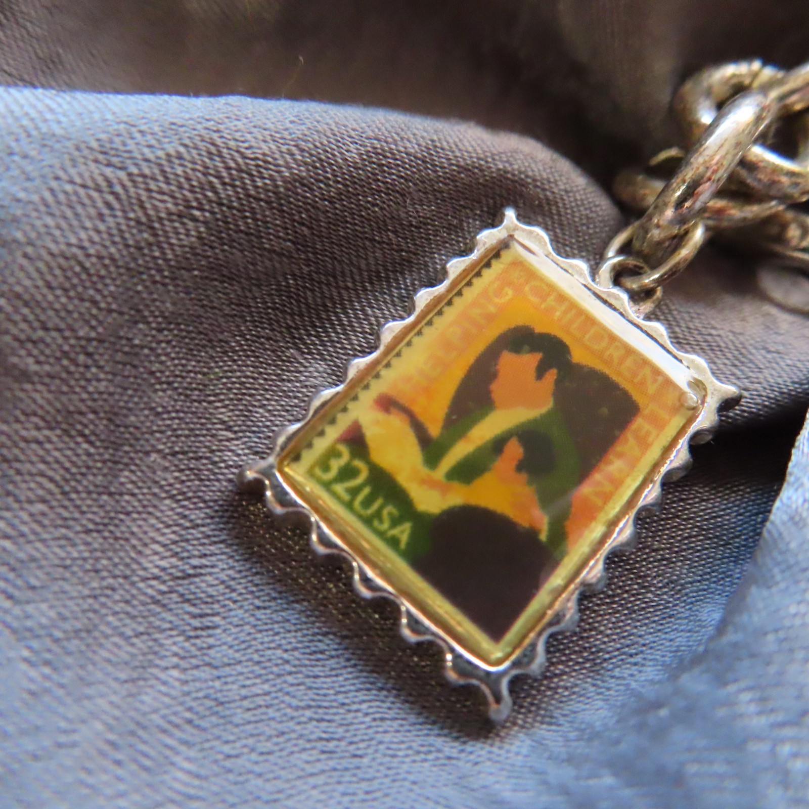 Education themed US Postal Stamp charm bracelet, silver-tone