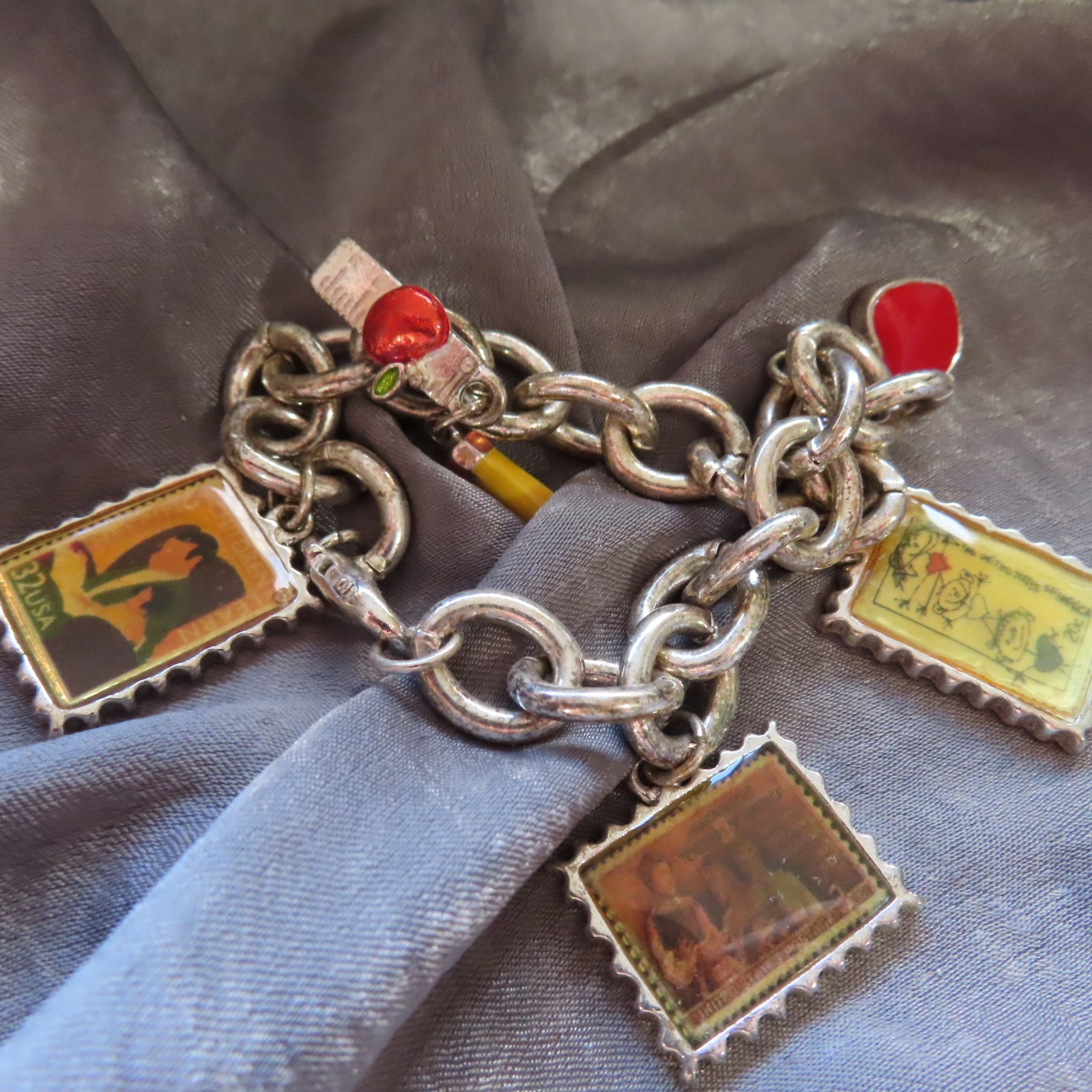 Education themed US Postal Stamp charm bracelet, silver-tone