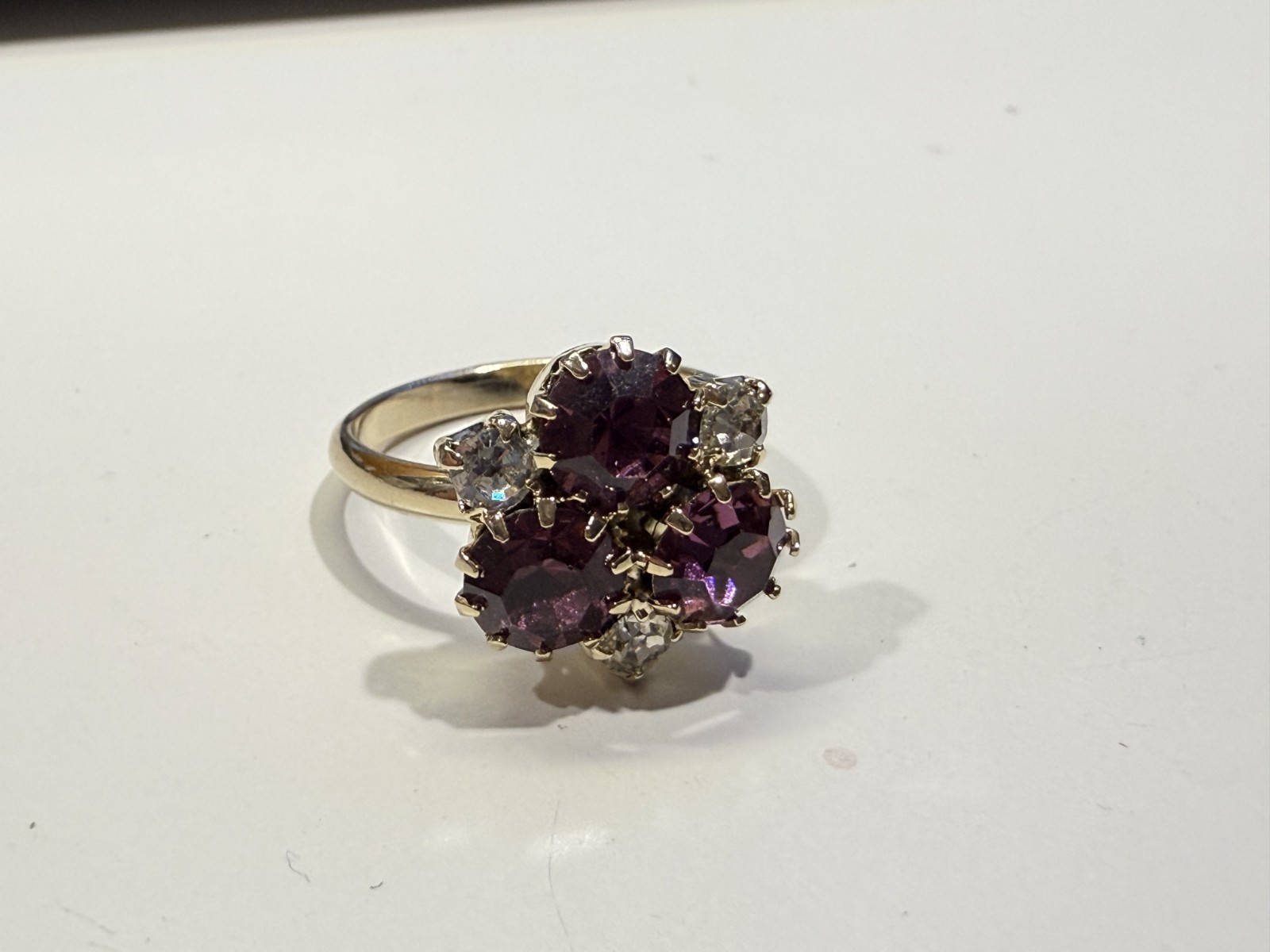 Gold tone with purple & clear stone cluster fashion ring Size 6.5 adjustable