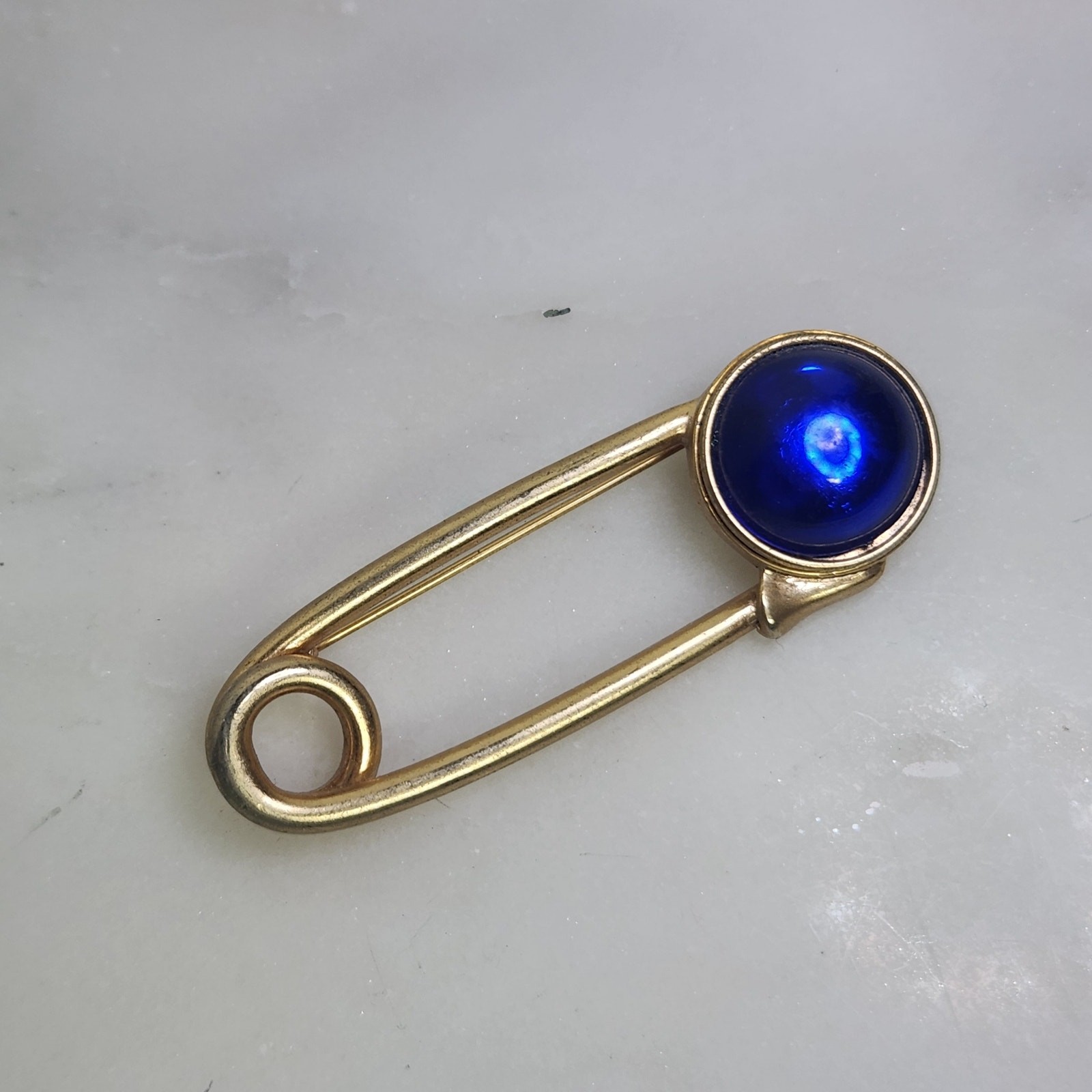 Vintage Swank Gold Tone Safety Pin Brooch Blue Cabochon Stone Lapel Pin MCM