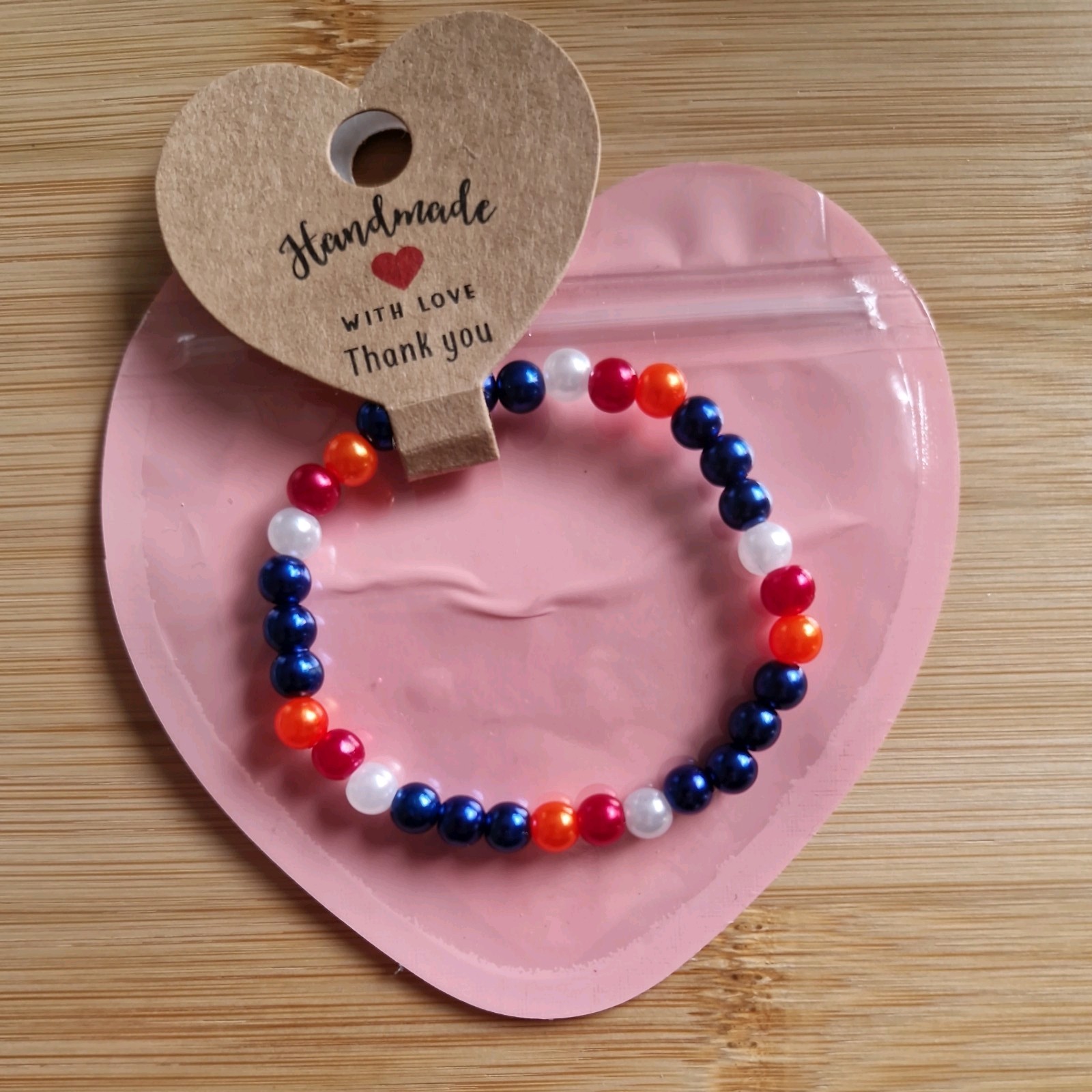 Texas Tailgaters Bracelet 15cm Red White Blue Orange Banana Ball NEW