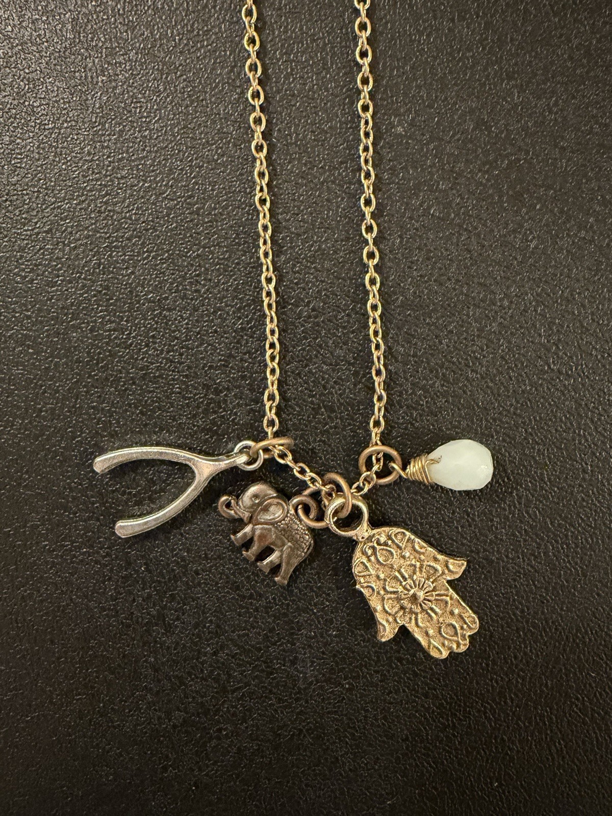 LEILA Jewelry Gold Tone Lucky Charm Necklace w/ Hamsa, Elephant & Wishbone 18in