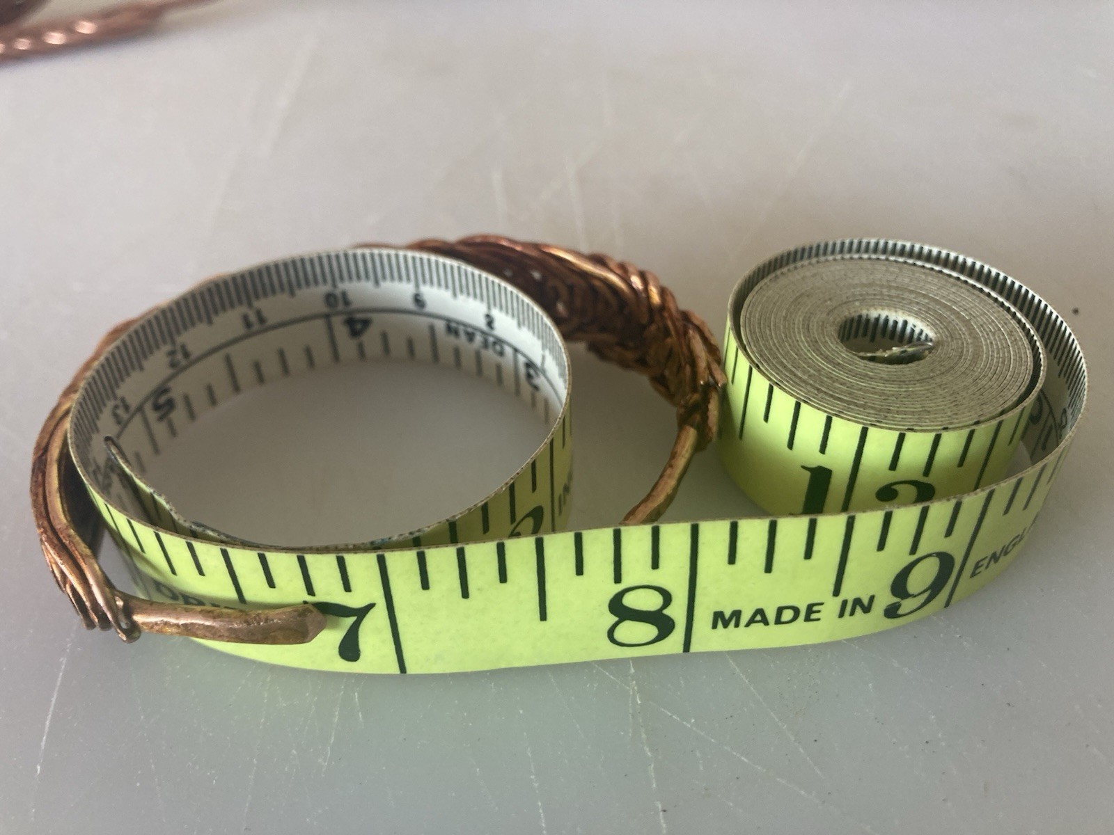 Braided copper cuff bracelet size 7 with a handmade, textured finish.