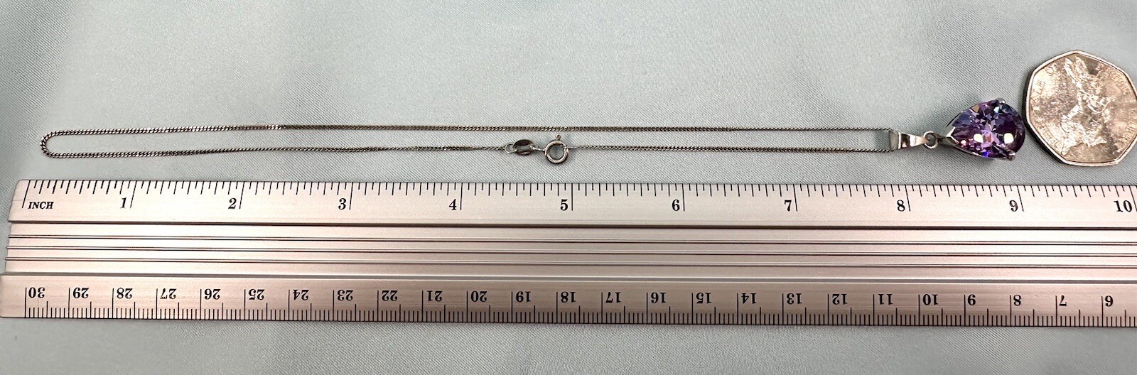Sterling Silver Purple Stone Pendant On 16 Inch Chain 7.52gm