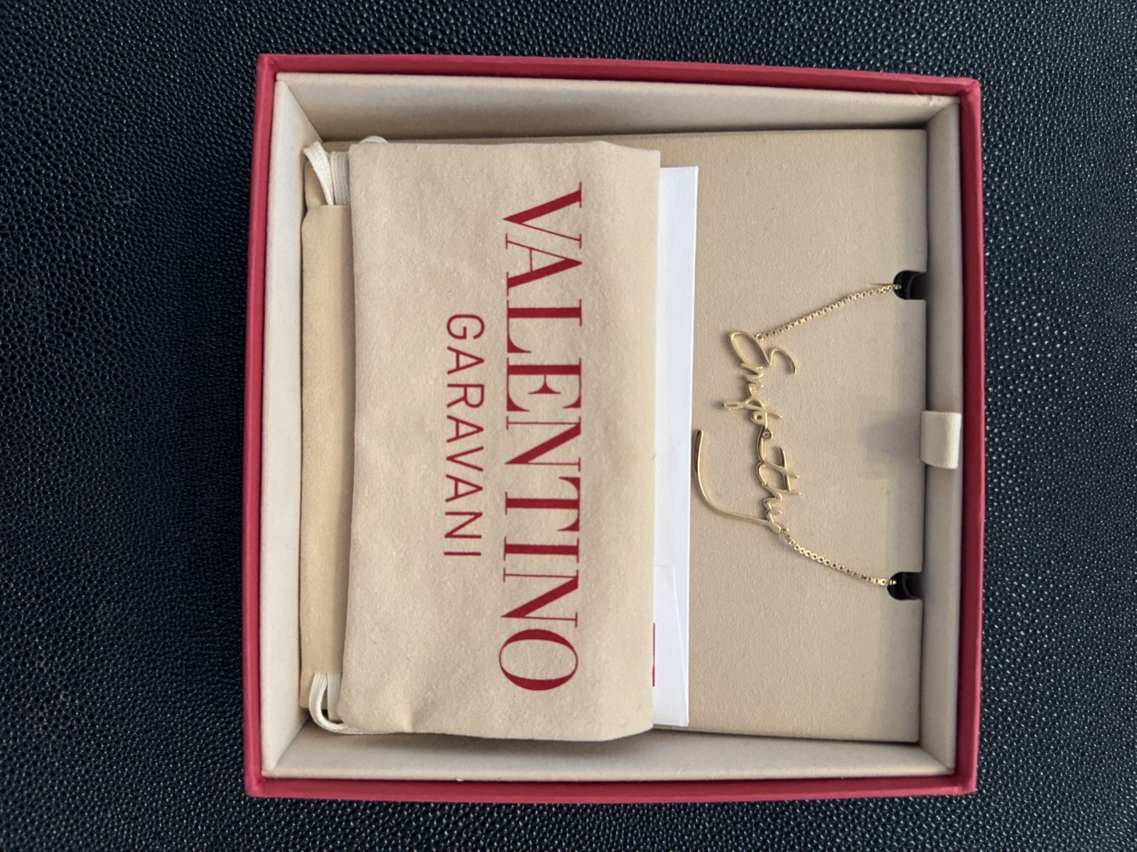 Valentino Garavani Empathy Gold Tone Word Pendant Chain Necklace