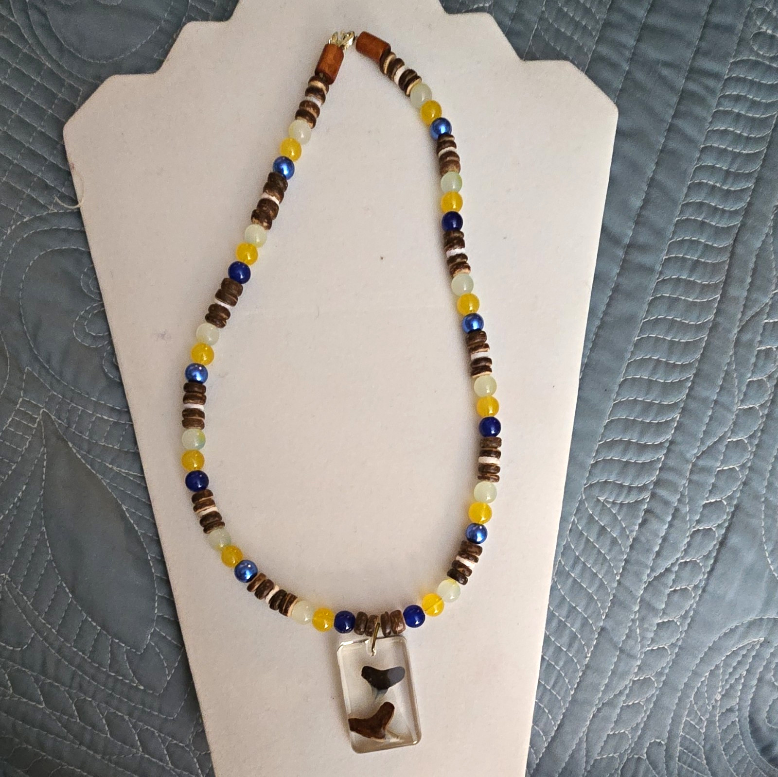 Beaded Necklace with Resin Shark Tooth Pendant, Glass And Coconut Shell Beads