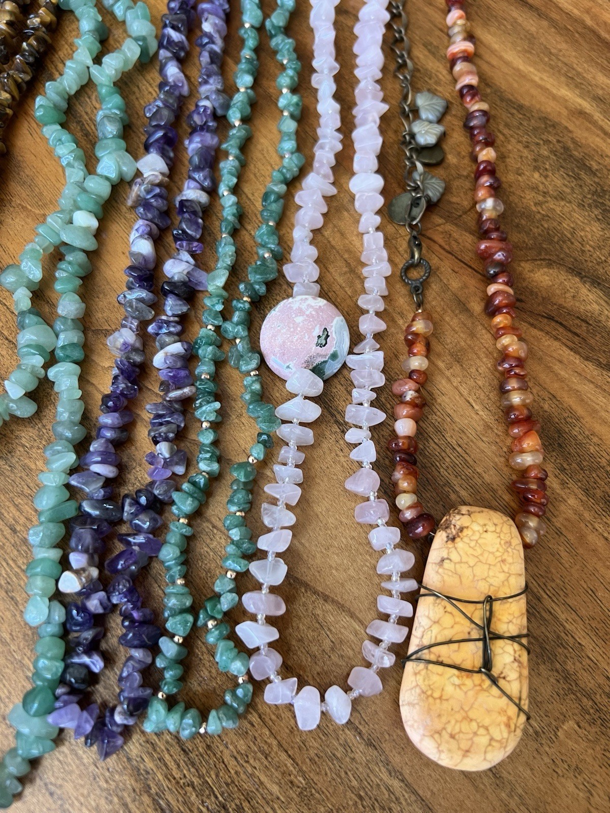 Spectacular lot of natural stone necklaces in pink, green, and brown