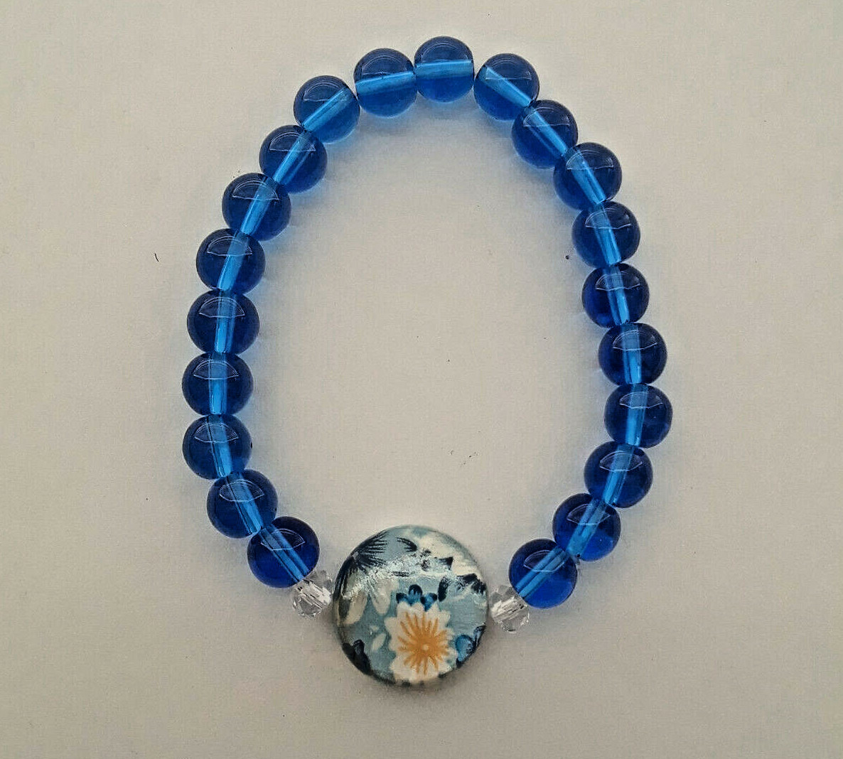 NEW BUY ANY 2 GET 3RD FREE, MOP SHELL & 8MM BLUE GLASS BRACELET