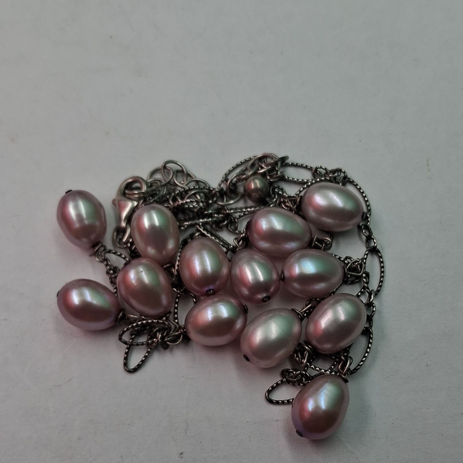 Sterling Silver Neckace whit a freshwater pearl oval link .