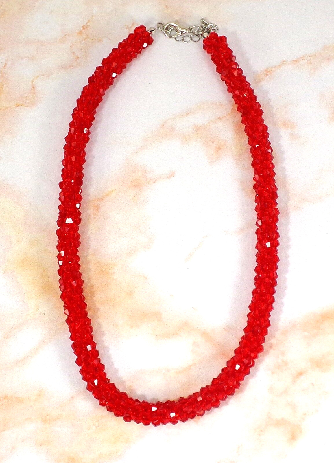 Red glass beaded necklace in a sparkling thick cluster beaded rope design New