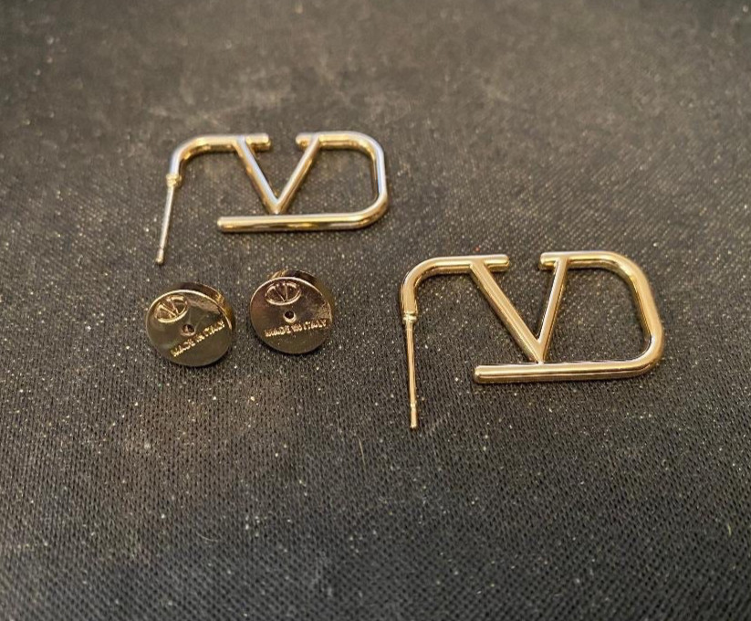 Stunning Pre loved Womens Valentino Gold Tone V Logo Earrings.