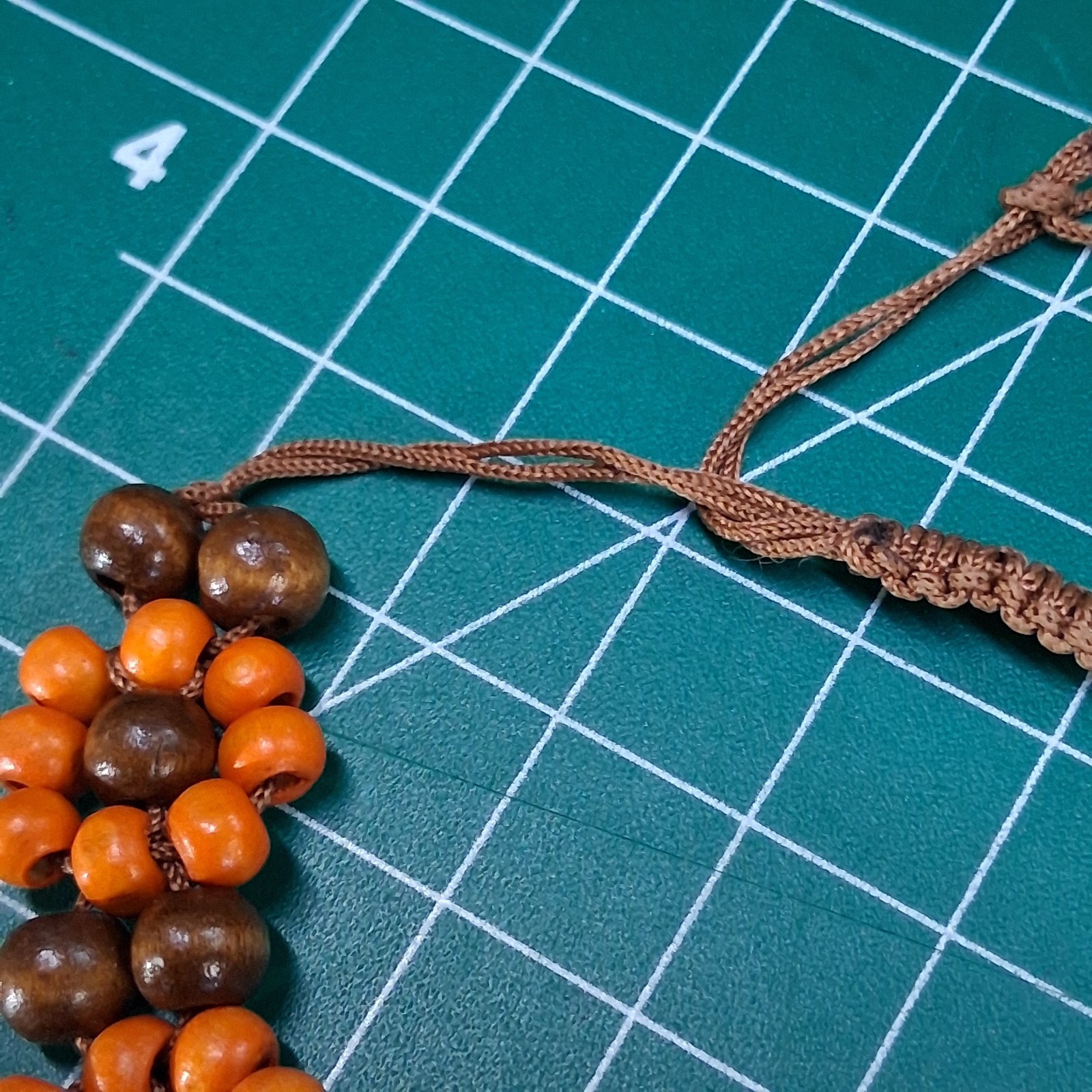 Orange & Natural Wood Channel Set Bead Adjustable Size Brown Cord Bracelet
