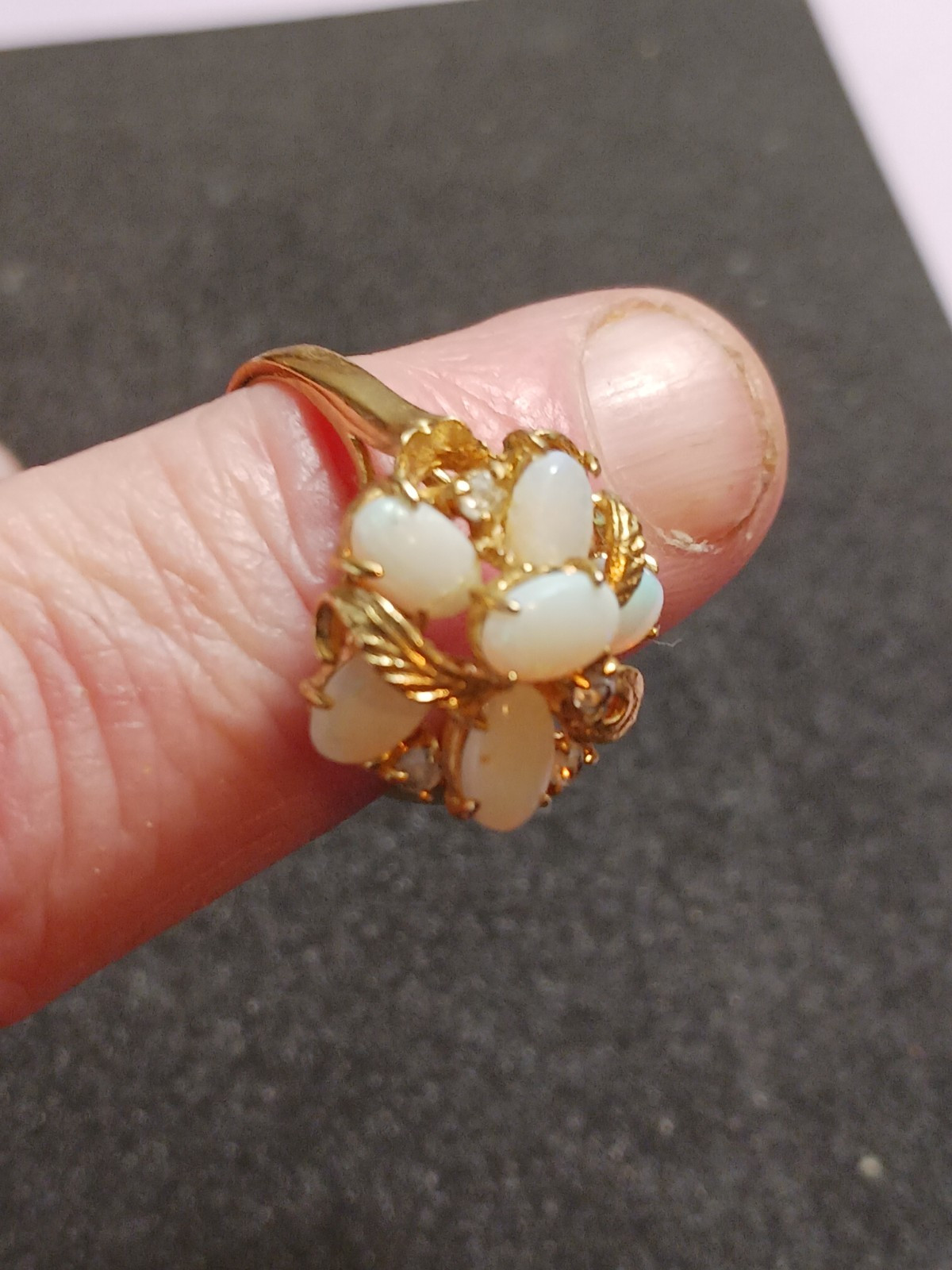 4 Beautiful Rings 3 with no markings 1 stamped M with a Trademark Nice