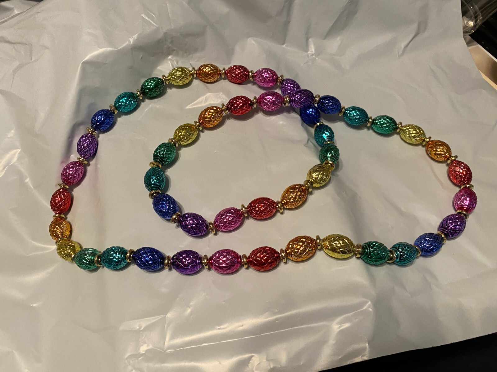 Beaded Necklace about 45 Inches long Pre owned in very good condition.