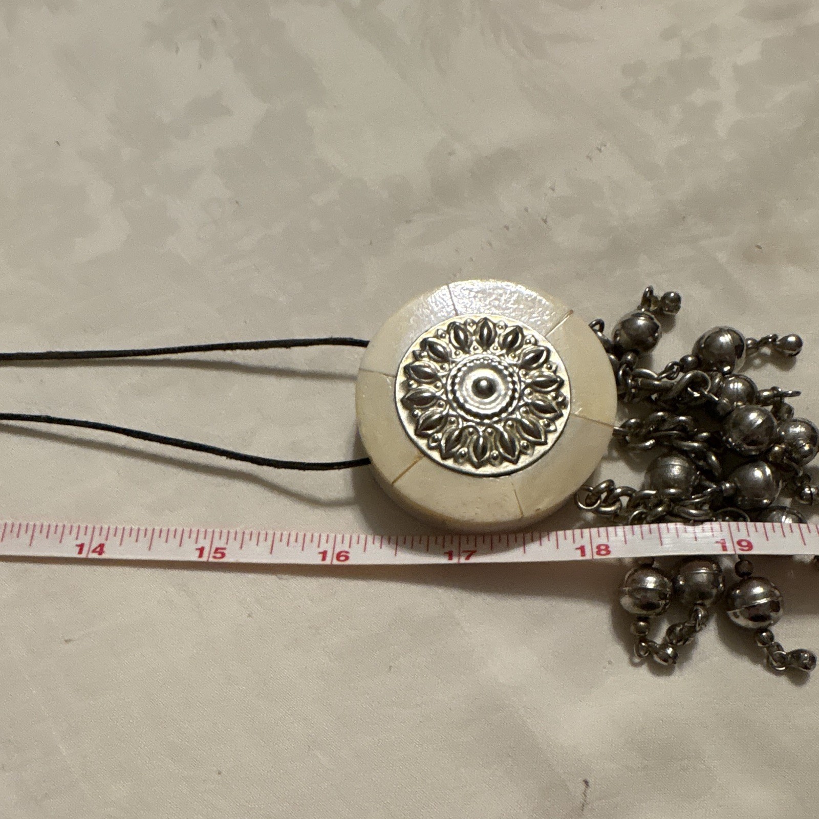 Vtg Round Cream & Silver Tone Charm Pendant Cord Necklace Silver Tone Dangles